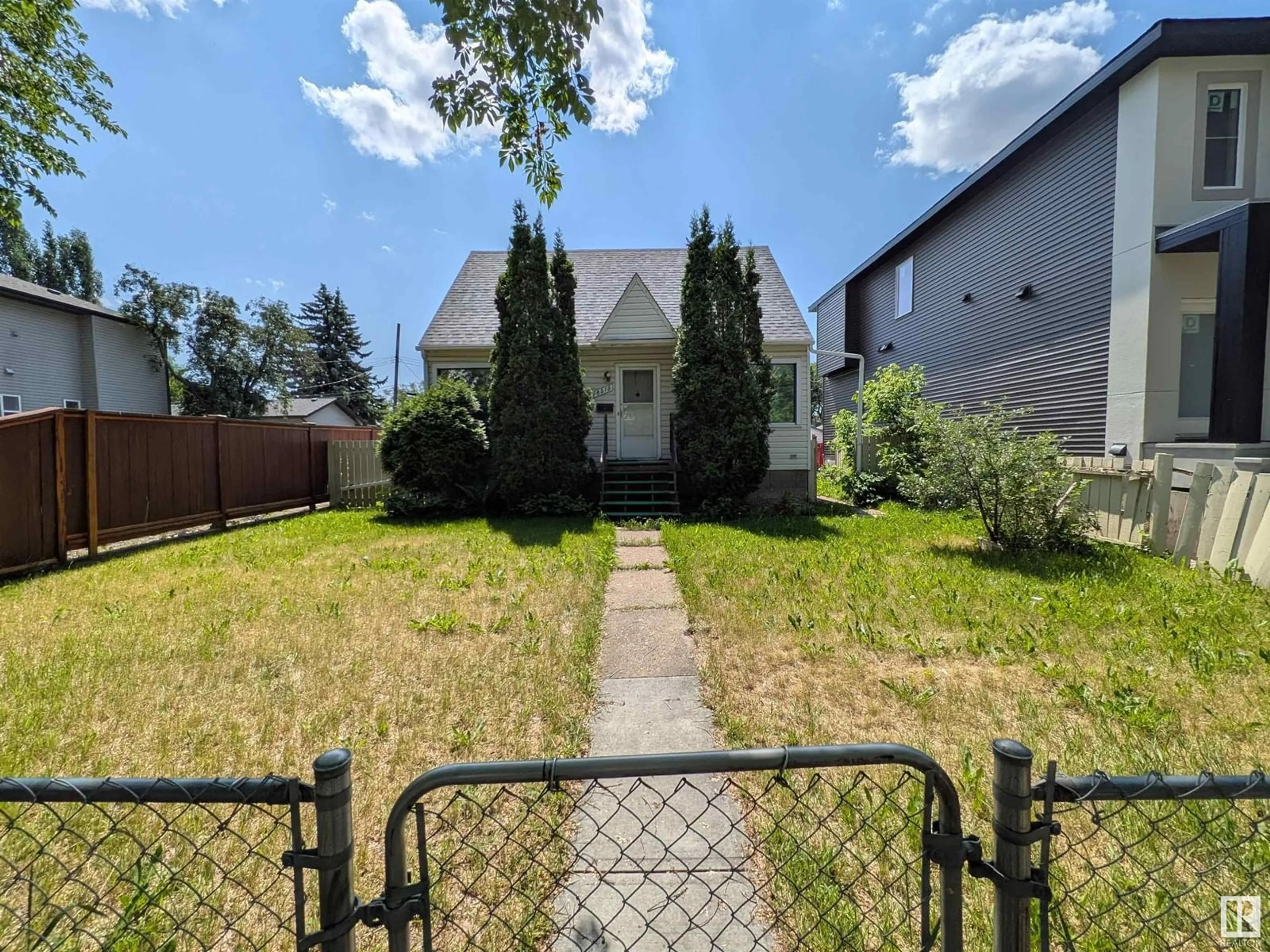 A pic from outside/outdoor area/front of a property/back of a property/a pic from drone, street for 8315 81 AV, Edmonton Alberta T6C0W1