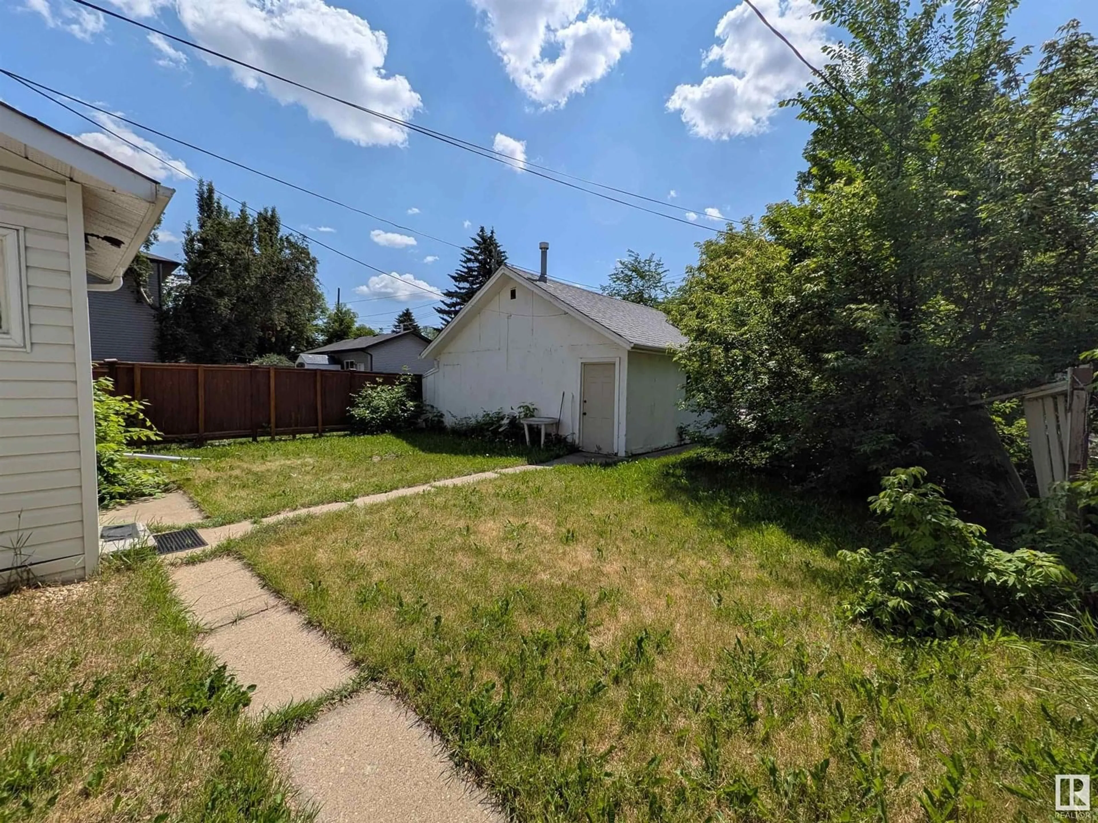 A pic from outside/outdoor area/front of a property/back of a property/a pic from drone, street for 8315 81 AV, Edmonton Alberta T6C0W1