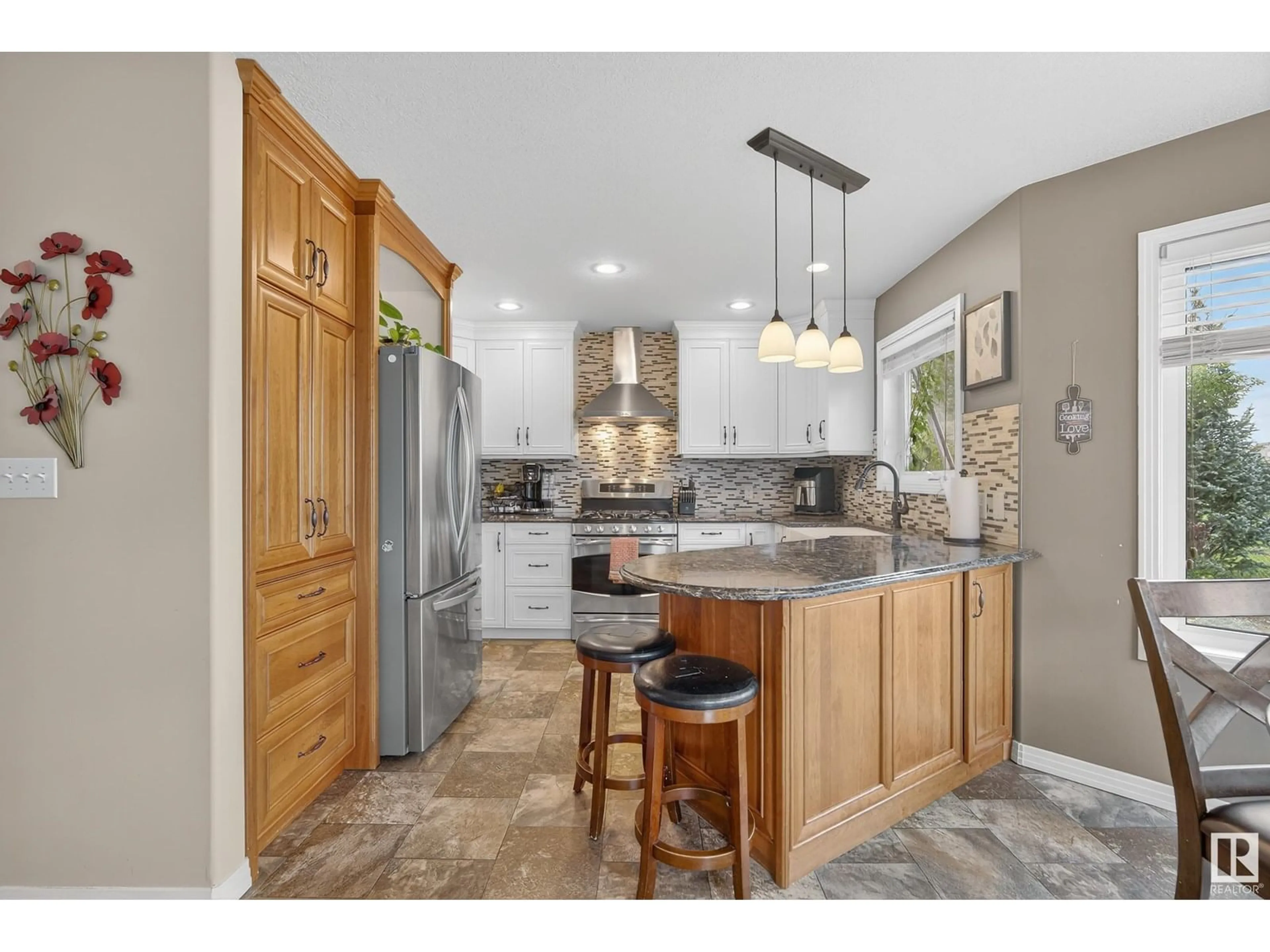 Open concept kitchen, ceramic/tile floor for 394 HOLLICK-KENYON RD, Edmonton Alberta T5Y2T7