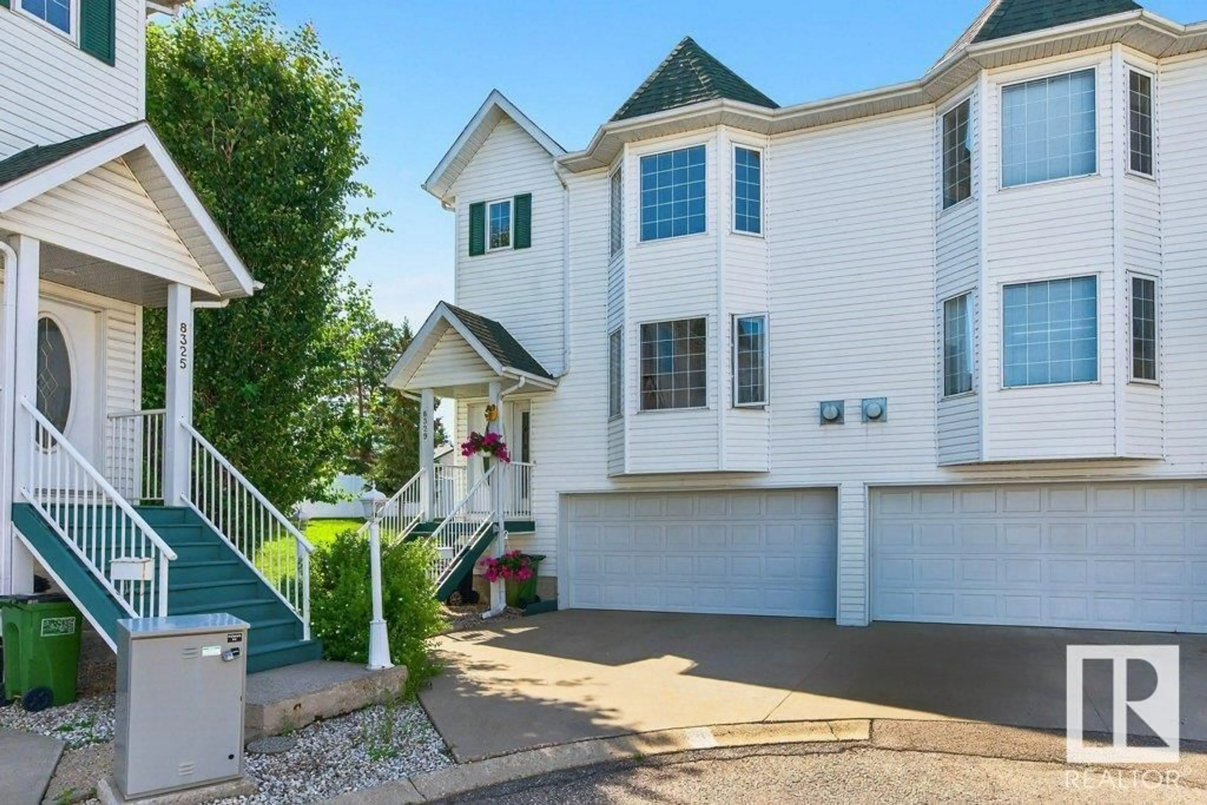 Home with vinyl exterior material, street for 8329 160 AV, Edmonton Alberta T5Z3G9