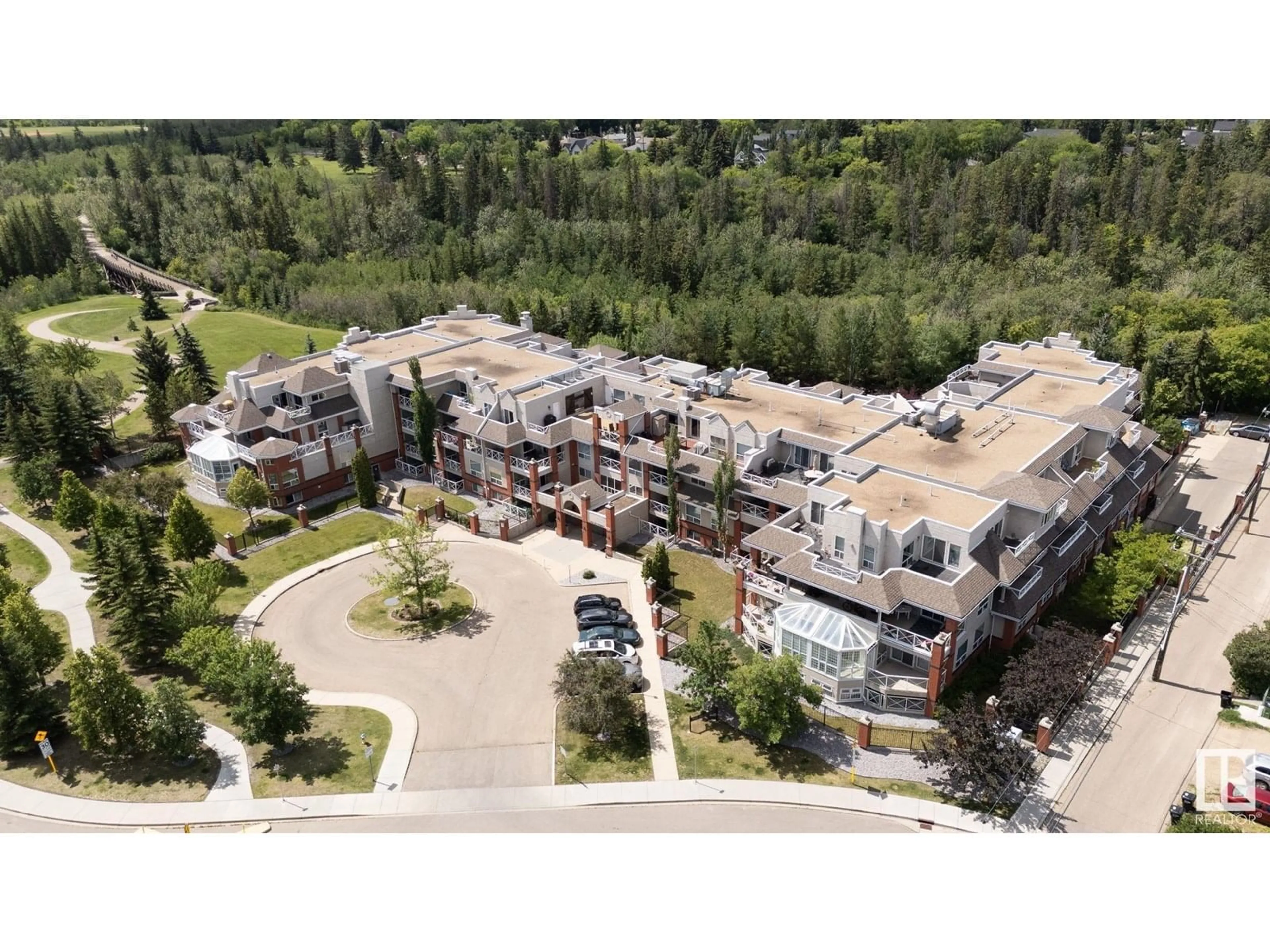 A pic from outside/outdoor area/front of a property/back of a property/a pic from drone, unknown for #205 - 7510 89 ST, Edmonton Alberta T6C0X5