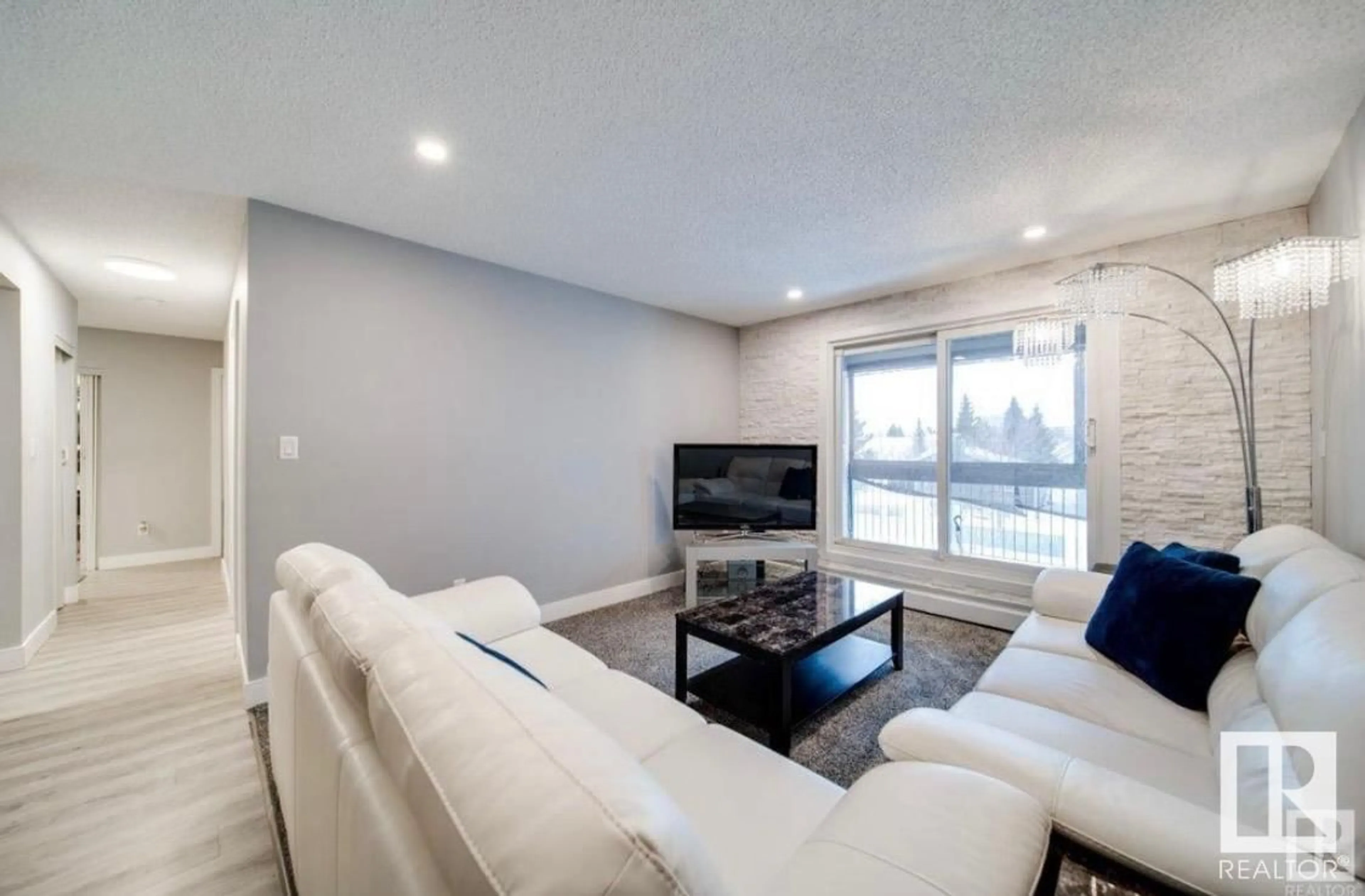 Living room with furniture, unknown for #301 - 4810 MILL WOODS RD S, Edmonton Alberta T6L5N9