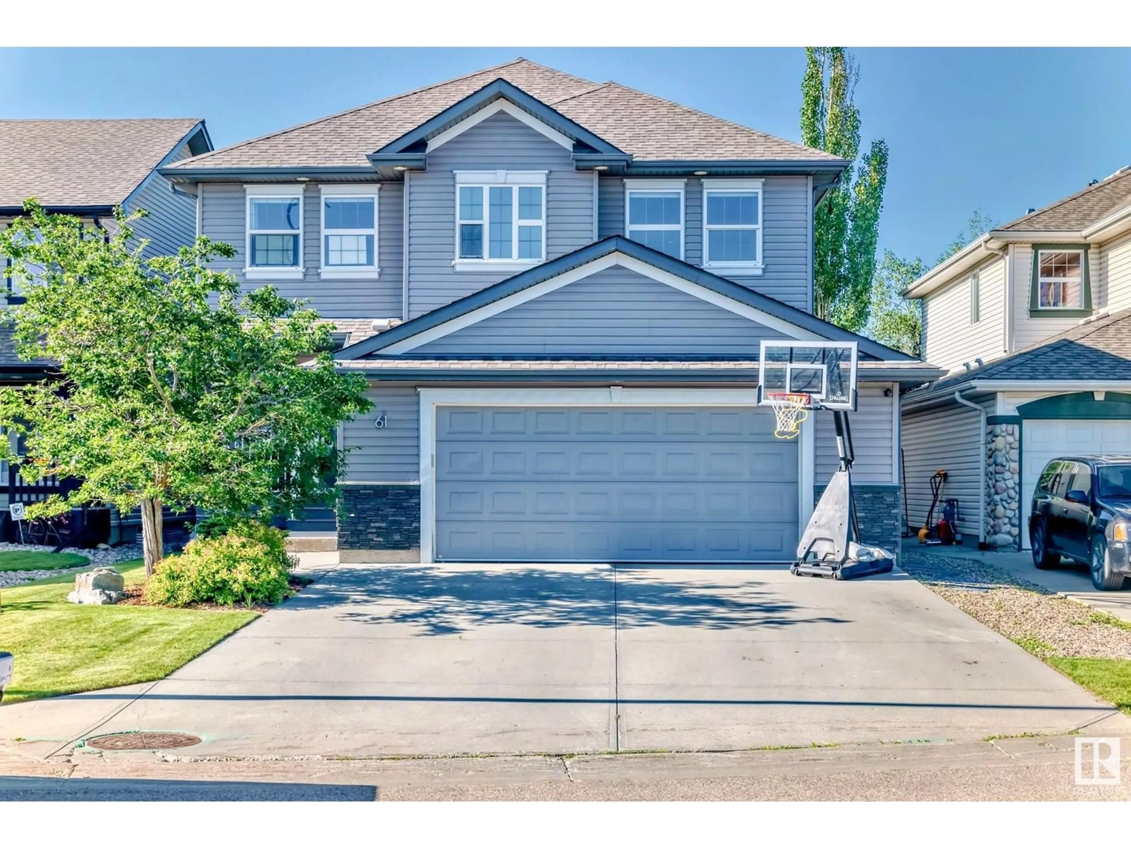 Home with vinyl exterior material, street for 61 SUMMERCOURT TC, Sherwood Park Alberta T8H2W1