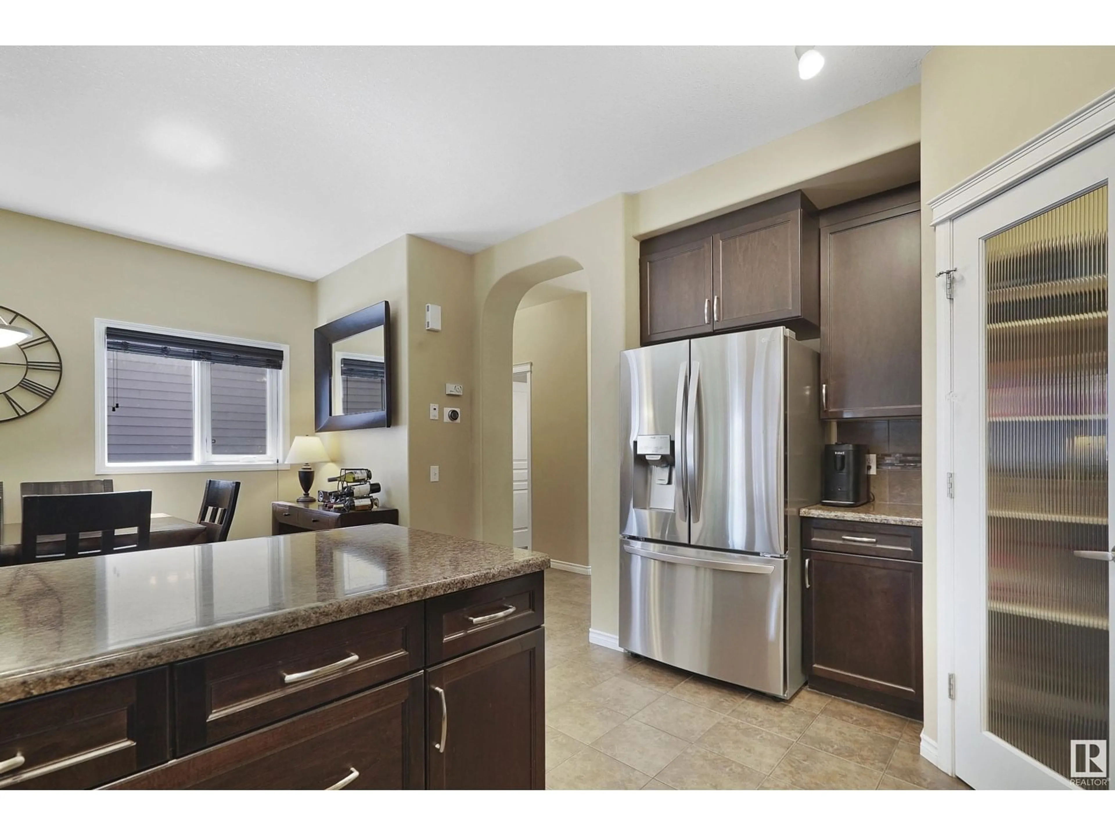 Open concept kitchen, ceramic/tile floor for 2035 74 ST, Edmonton Alberta T6X0V7