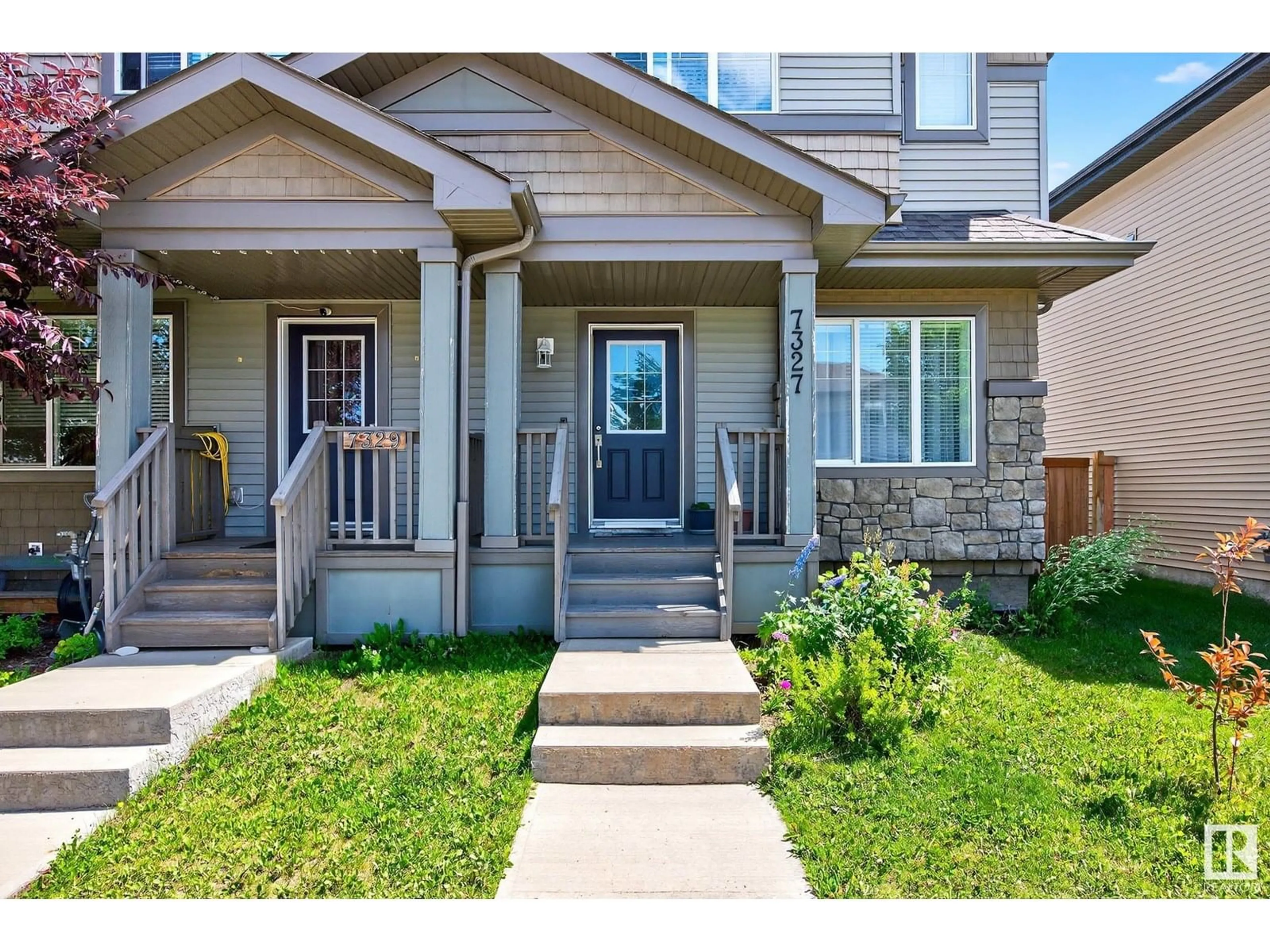 Home with vinyl exterior material, street for 7327 EDGEMONT WY, Edmonton Alberta T6M0S1