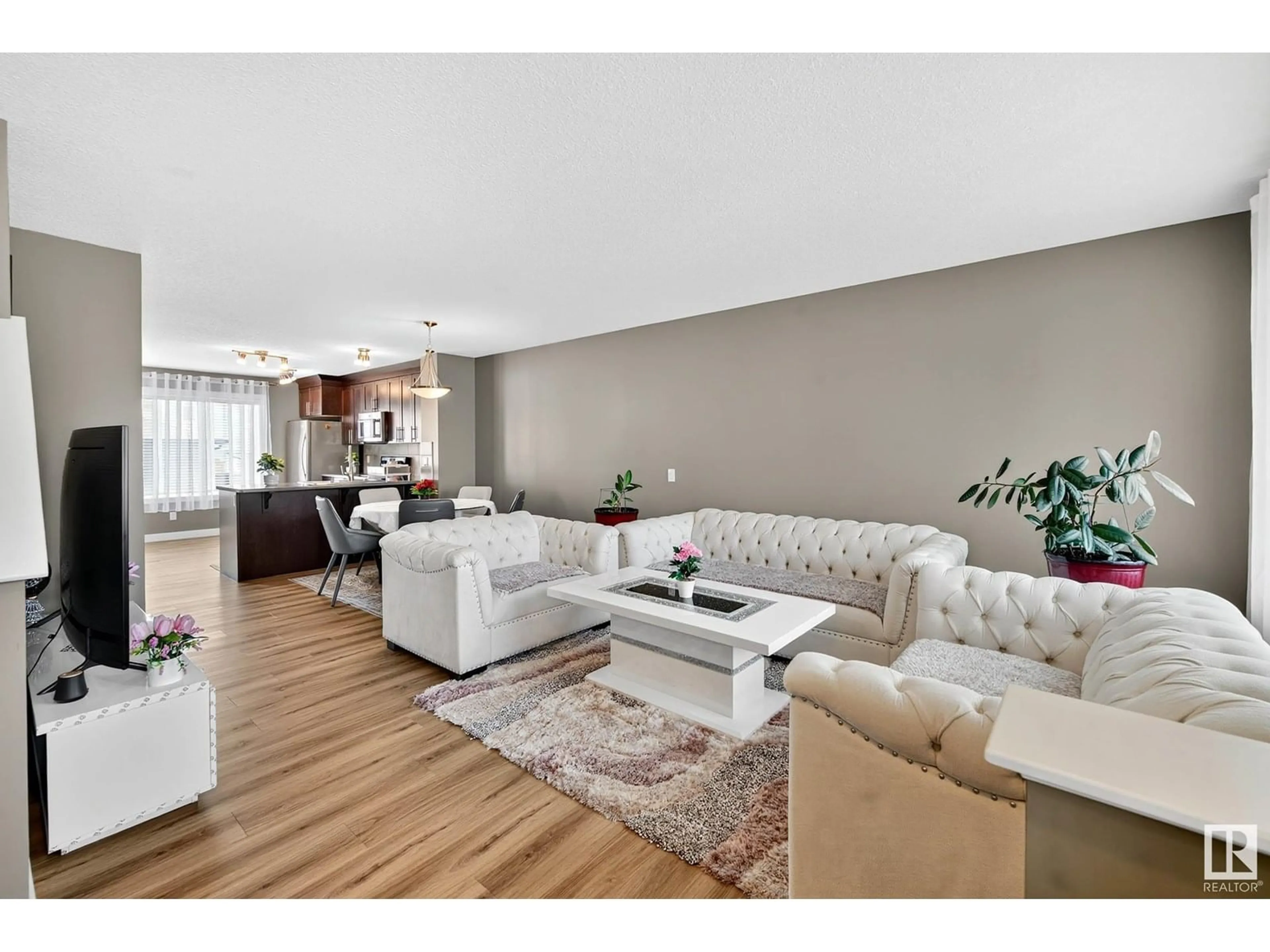 Living room with furniture, unknown for 7327 EDGEMONT WY, Edmonton Alberta T6M0S1