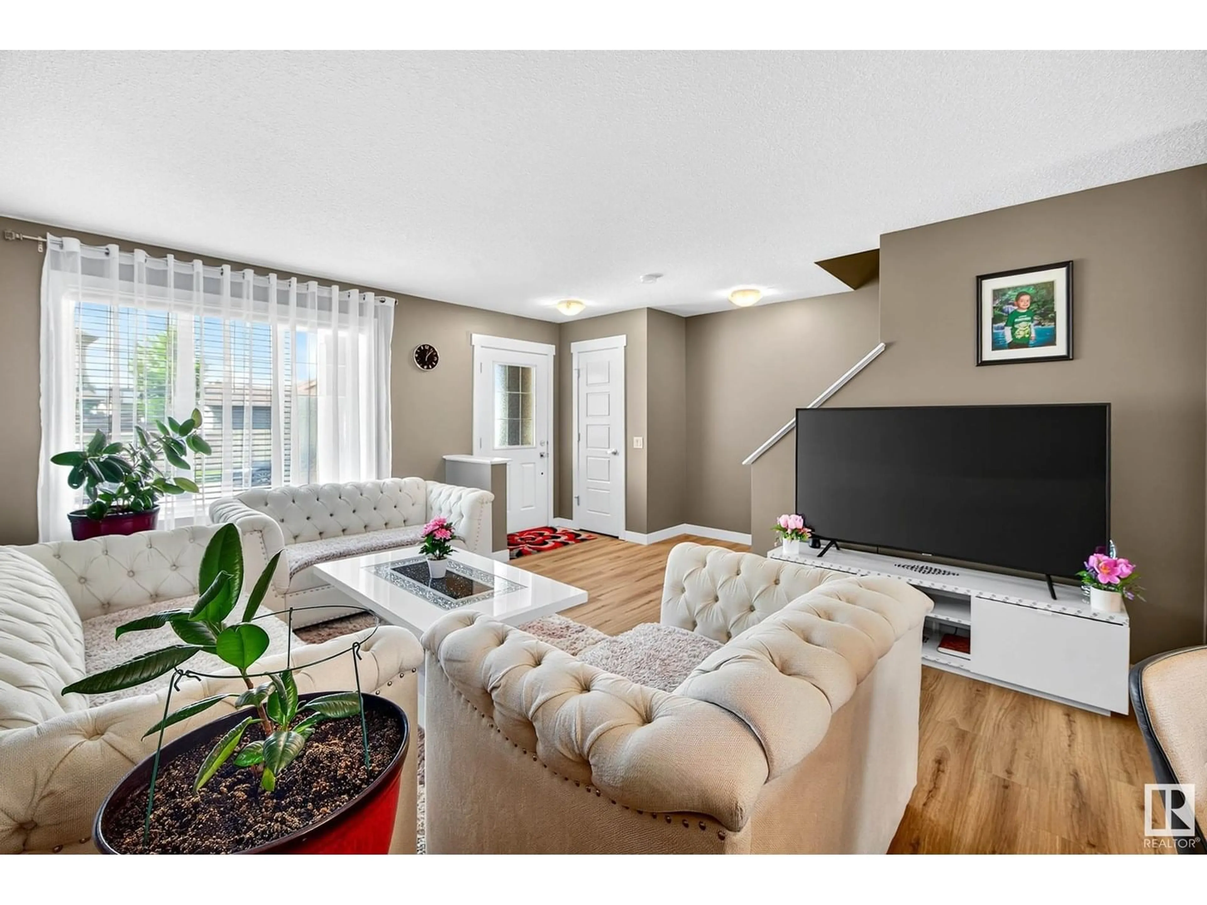 Living room with furniture, unknown for 7327 EDGEMONT WY, Edmonton Alberta T6M0S1