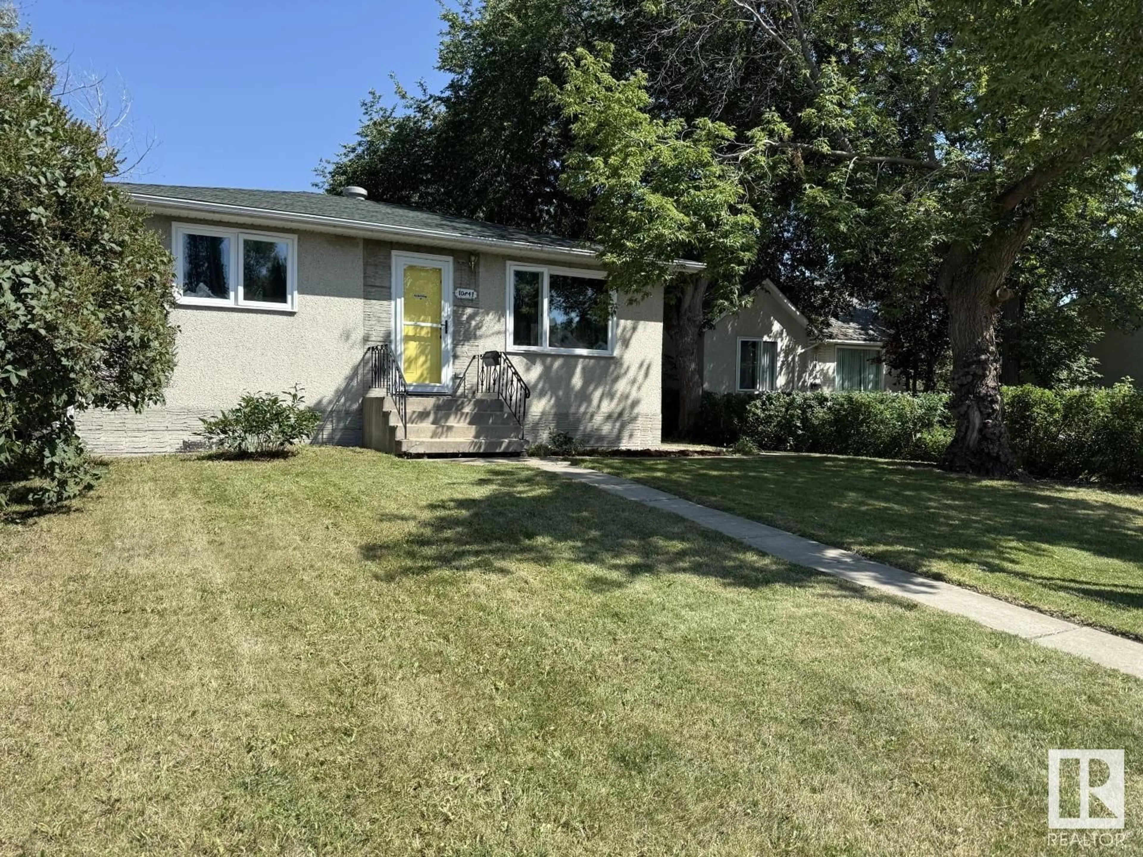 Home with vinyl exterior material, street for 10841 154 ST, Edmonton Alberta T5P2J6