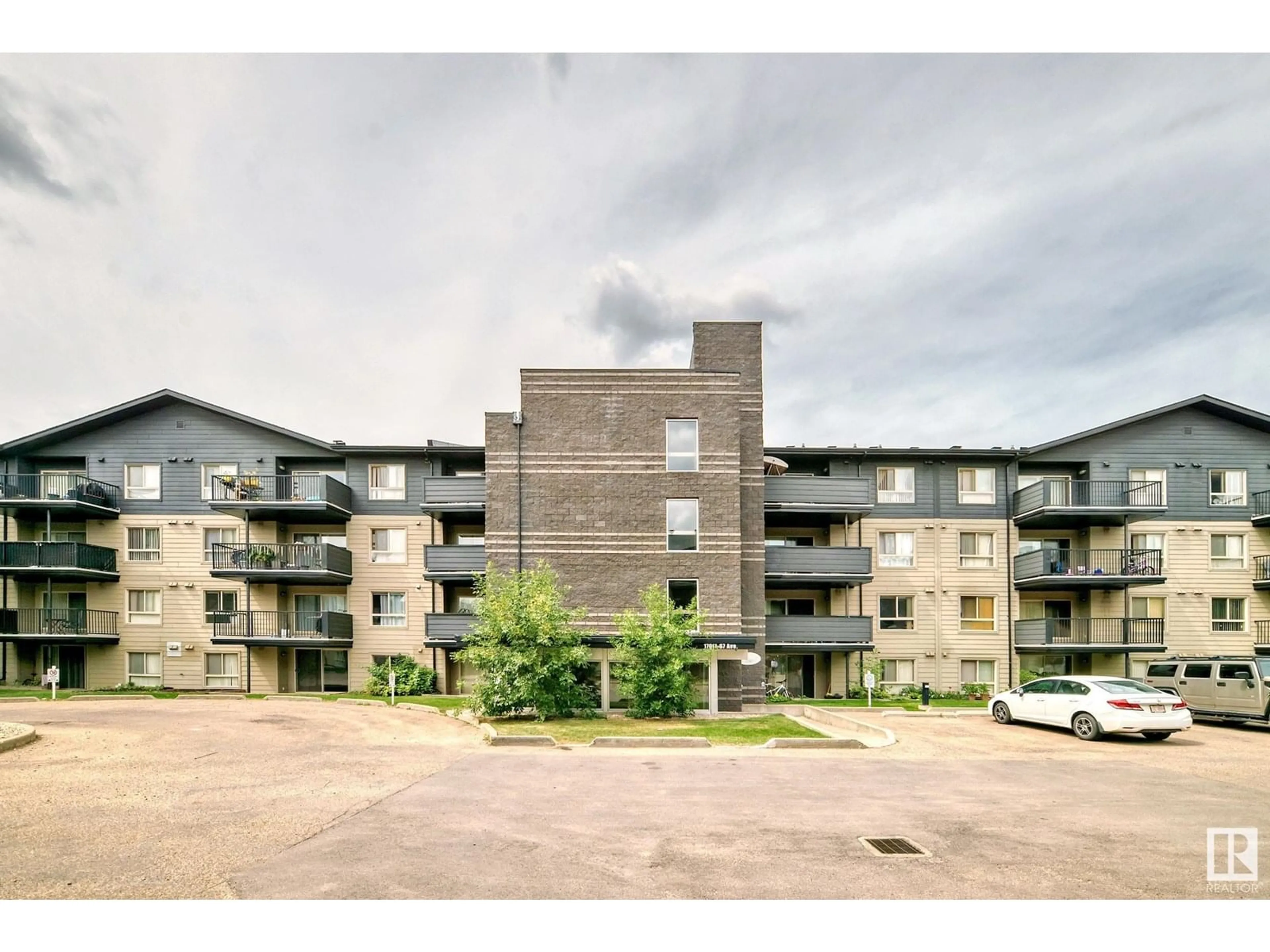 A pic from outside/outdoor area/front of a property/back of a property/a pic from drone, building for #307 - 17011 67 AV, Edmonton Alberta T5T6Y6