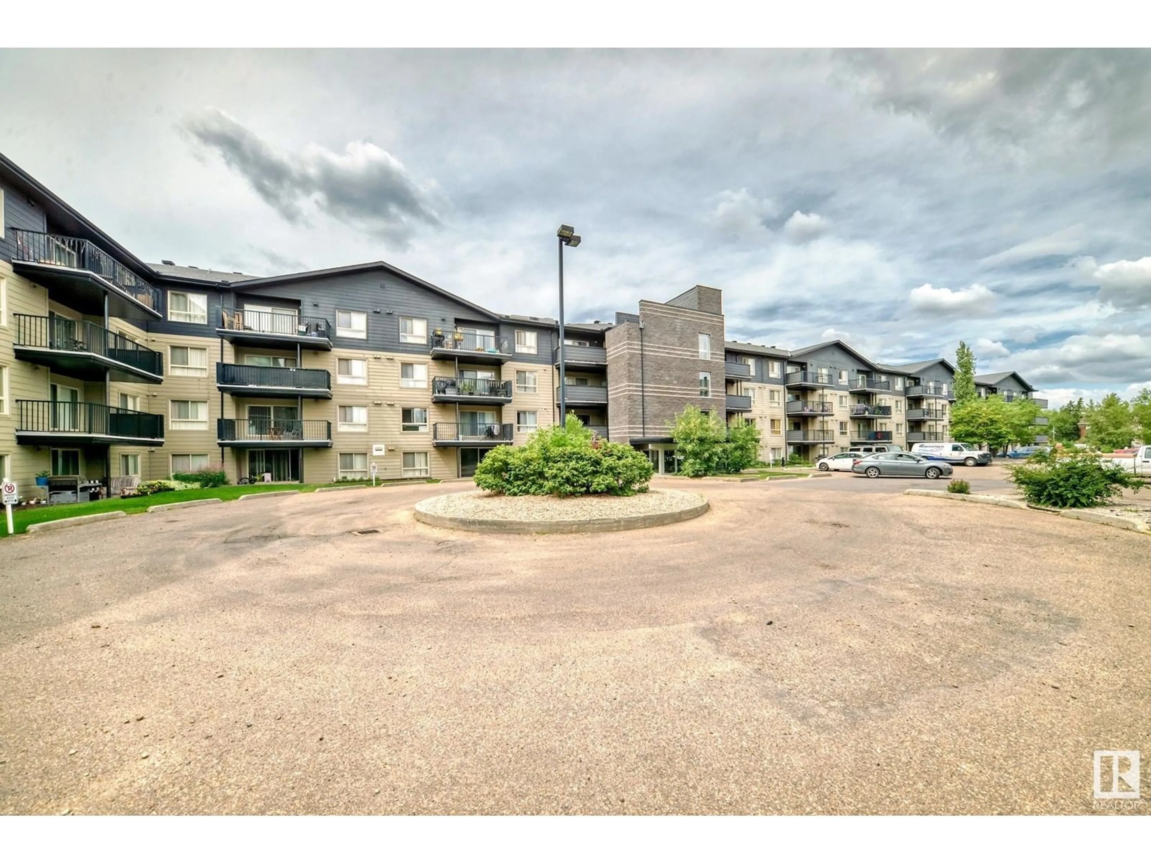 A pic from outside/outdoor area/front of a property/back of a property/a pic from drone, unknown for #307 - 17011 67 AV, Edmonton Alberta T5T6Y6