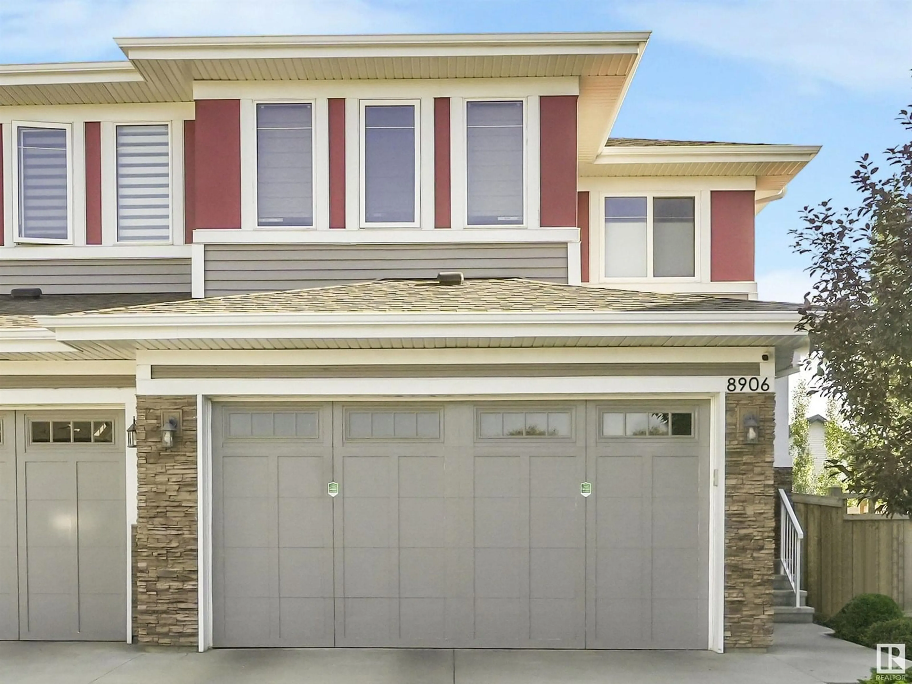 Home with vinyl exterior material, street for NW - 8906 217 ST, Edmonton Alberta T5T7C4