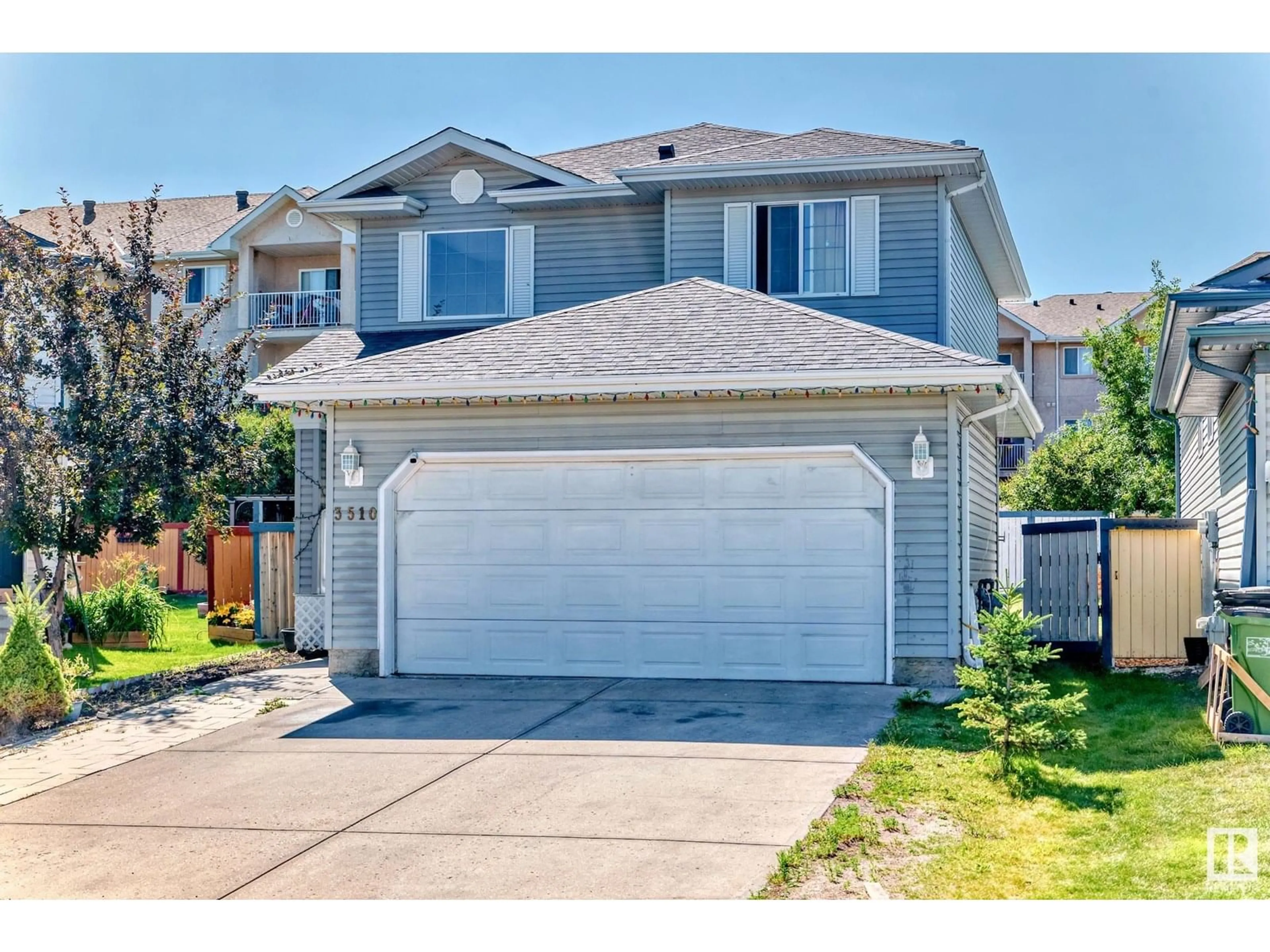 Home with vinyl exterior material, street for 3510 22 ST, Edmonton Alberta T6T1W2