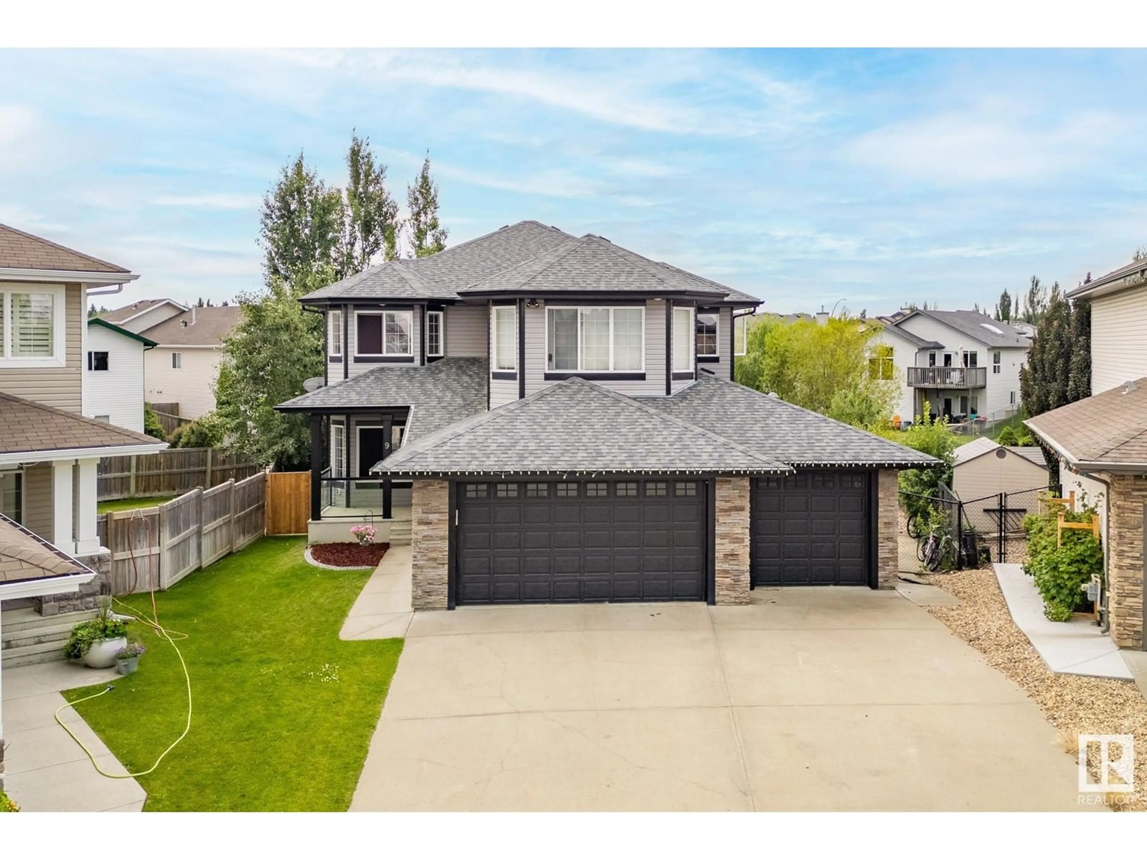 A pic from outside/outdoor area/front of a property/back of a property/a pic from drone, street for 9 HILBORN CV, Spruce Grove Alberta T7X0J2
