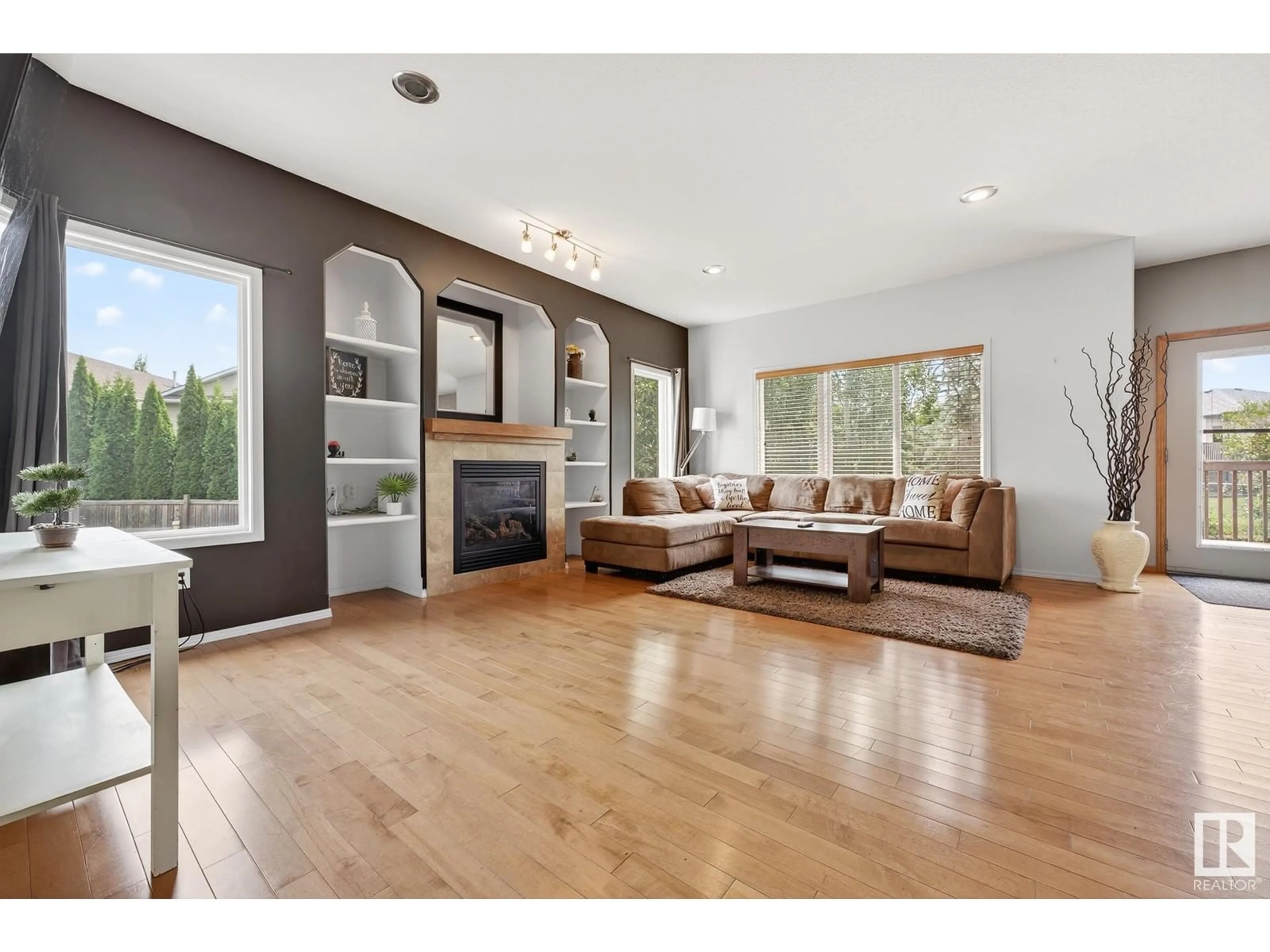Living room with furniture, wood/laminate floor for 9 HILBORN CV, Spruce Grove Alberta T7X0J2