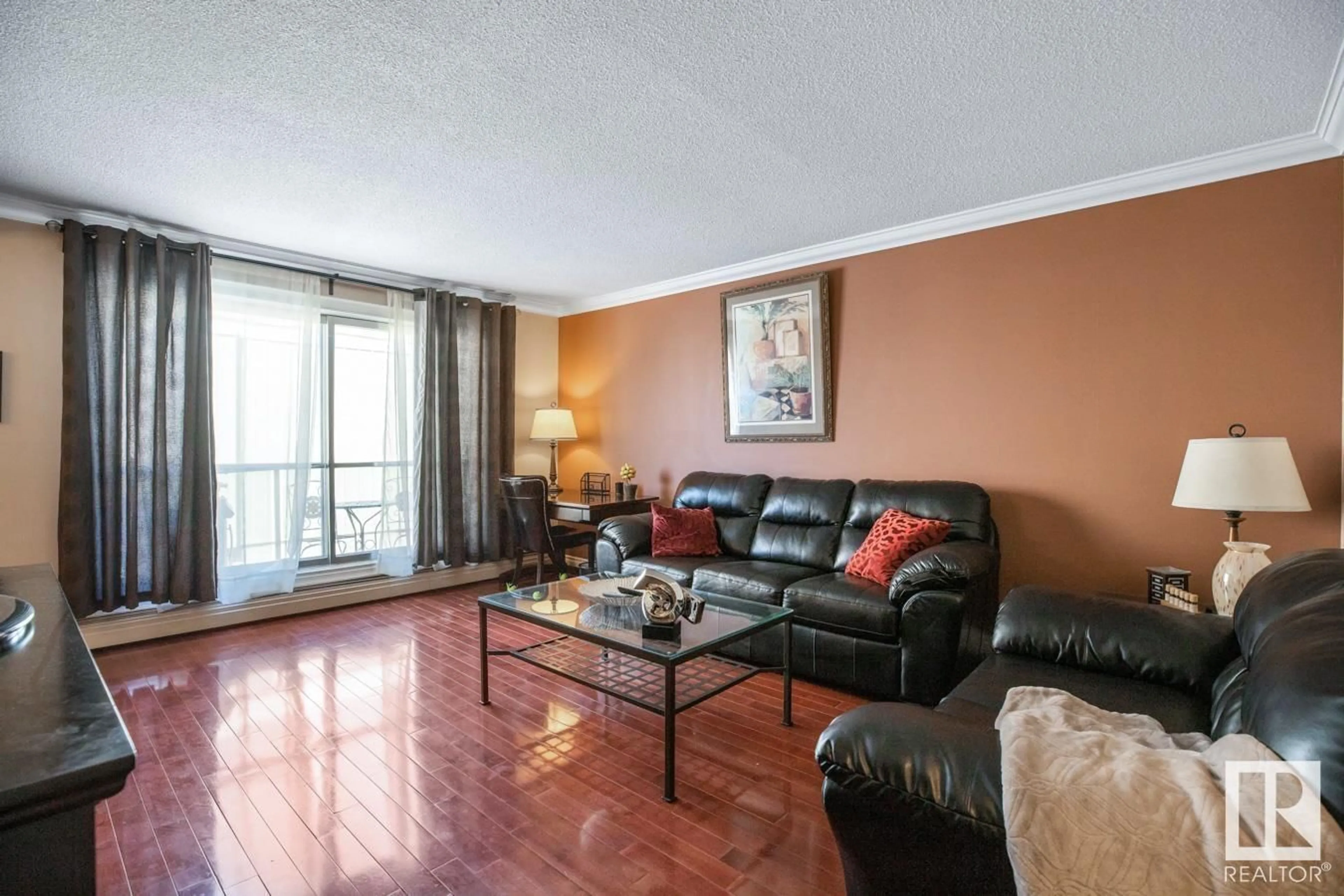 Living room with furniture, wood/laminate floor for #306 - 10745 83 AV, Edmonton Alberta T6E2E4
