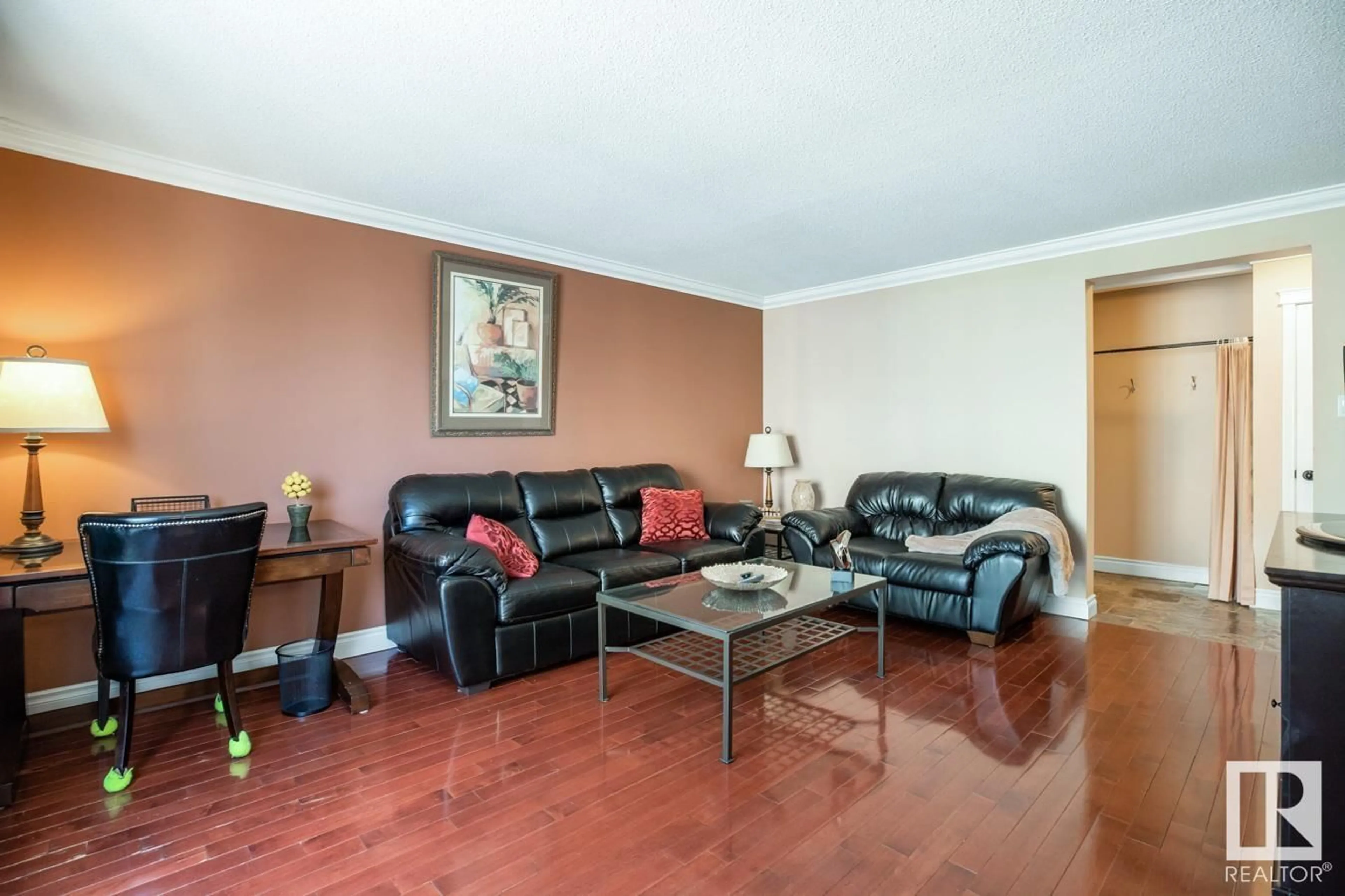 Living room with furniture, wood/laminate floor for #306 - 10745 83 AV, Edmonton Alberta T6E2E4