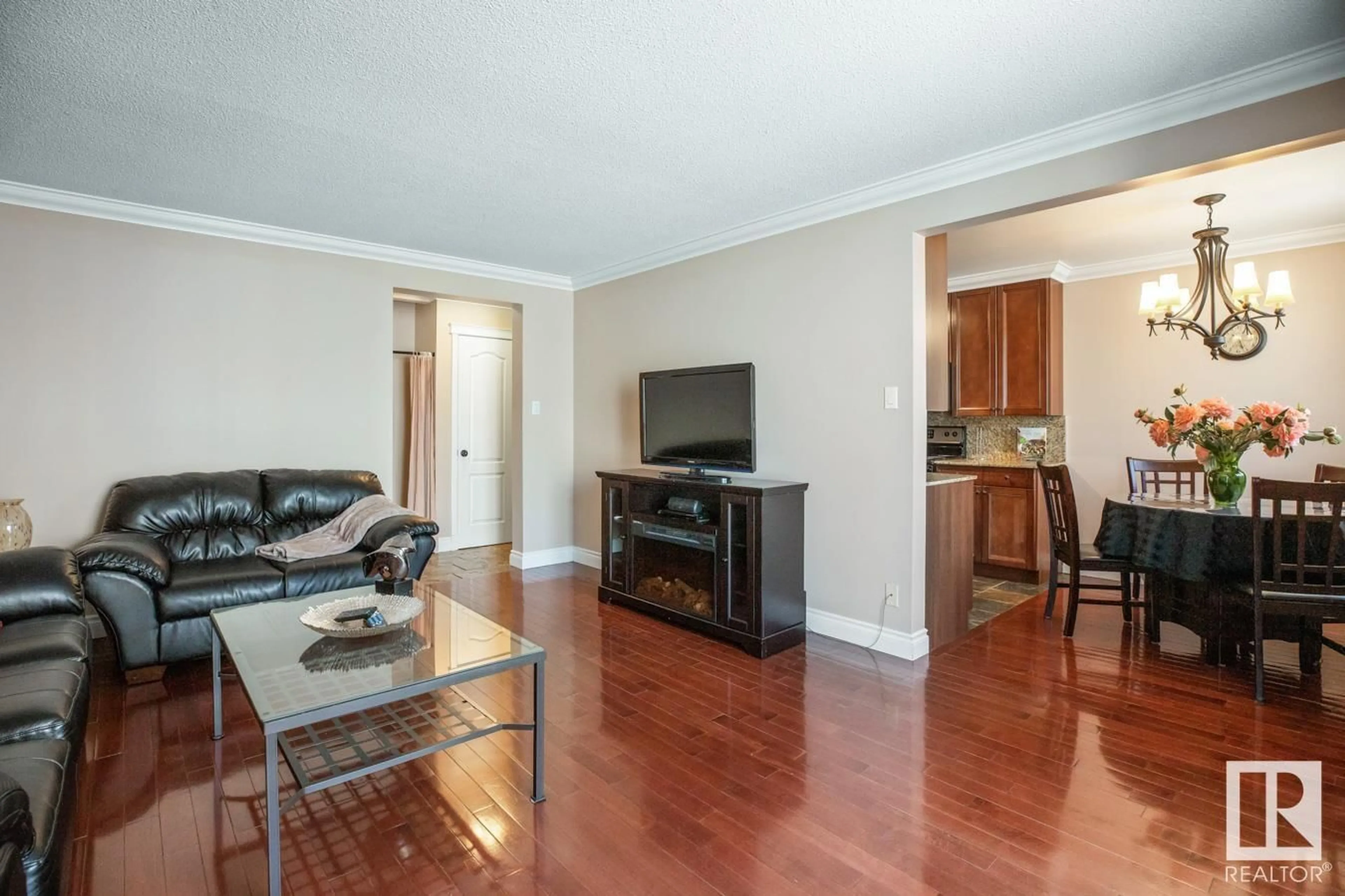 Living room with furniture, wood/laminate floor for #306 - 10745 83 AV, Edmonton Alberta T6E2E4