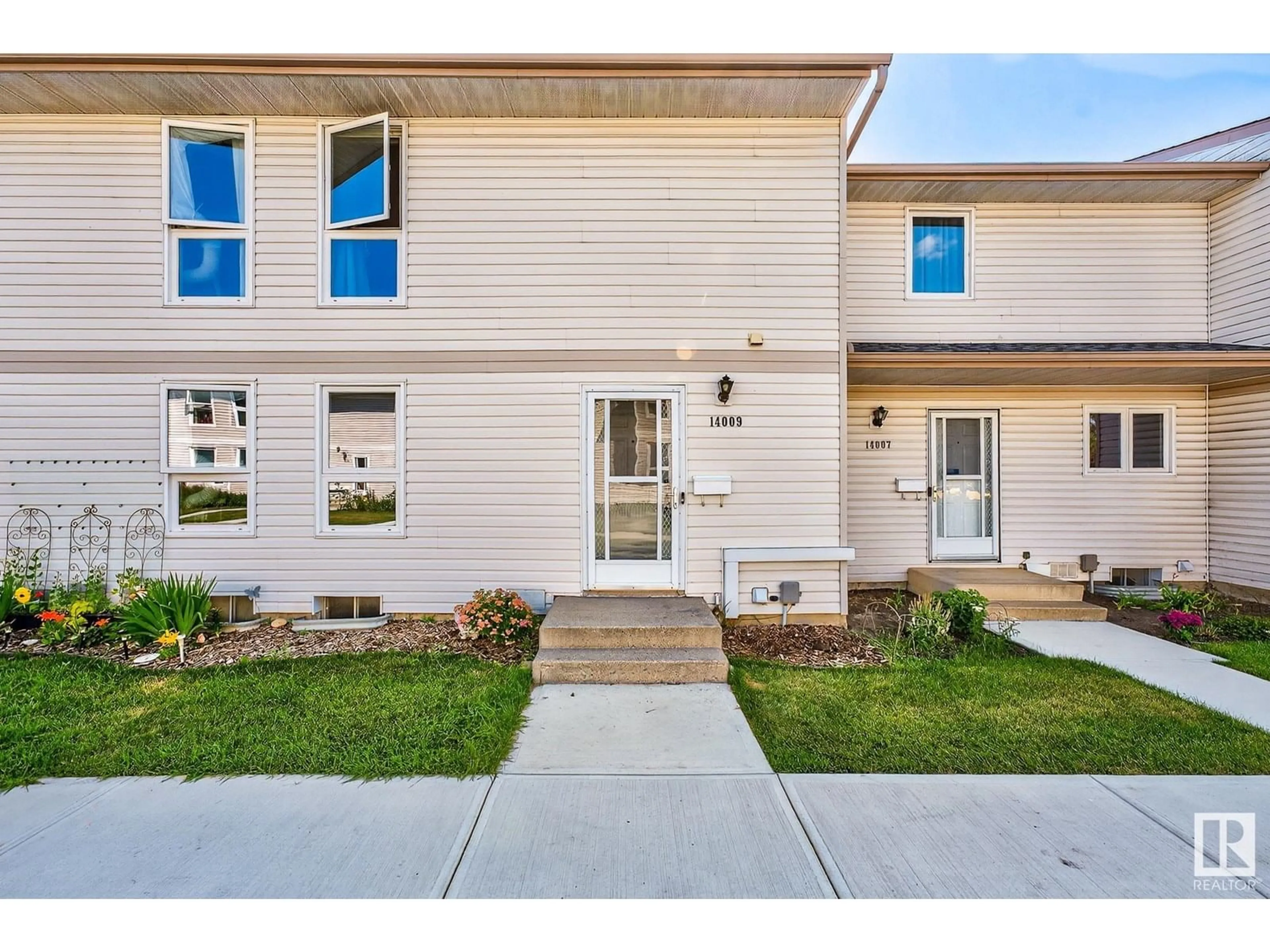 Home with brick exterior material, street for 14009 121 ST, Edmonton Alberta T5X4H8