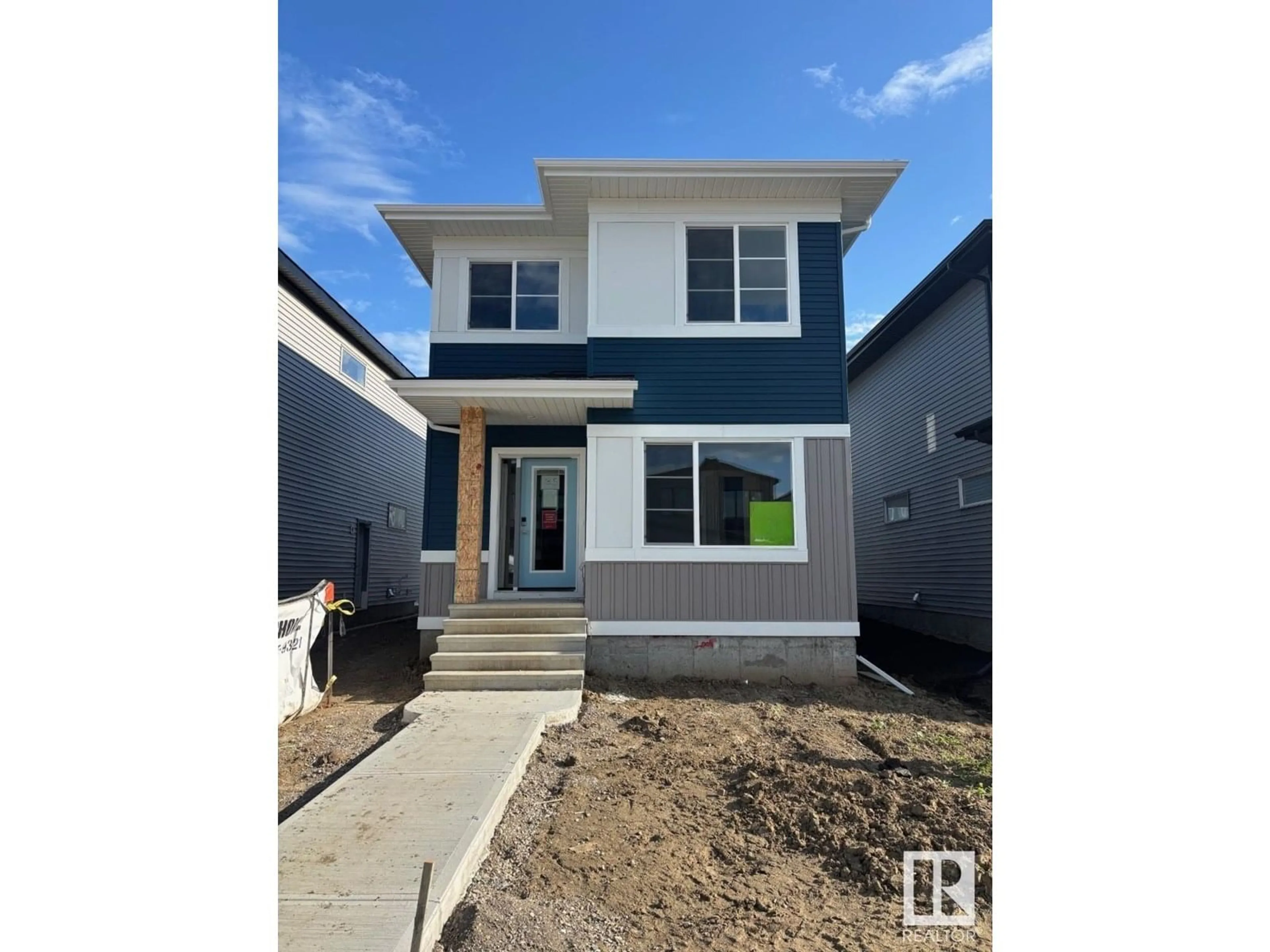 Home with vinyl exterior material, street for 35 GAMBEL LO, Spruce Grove Alberta T7X0C9