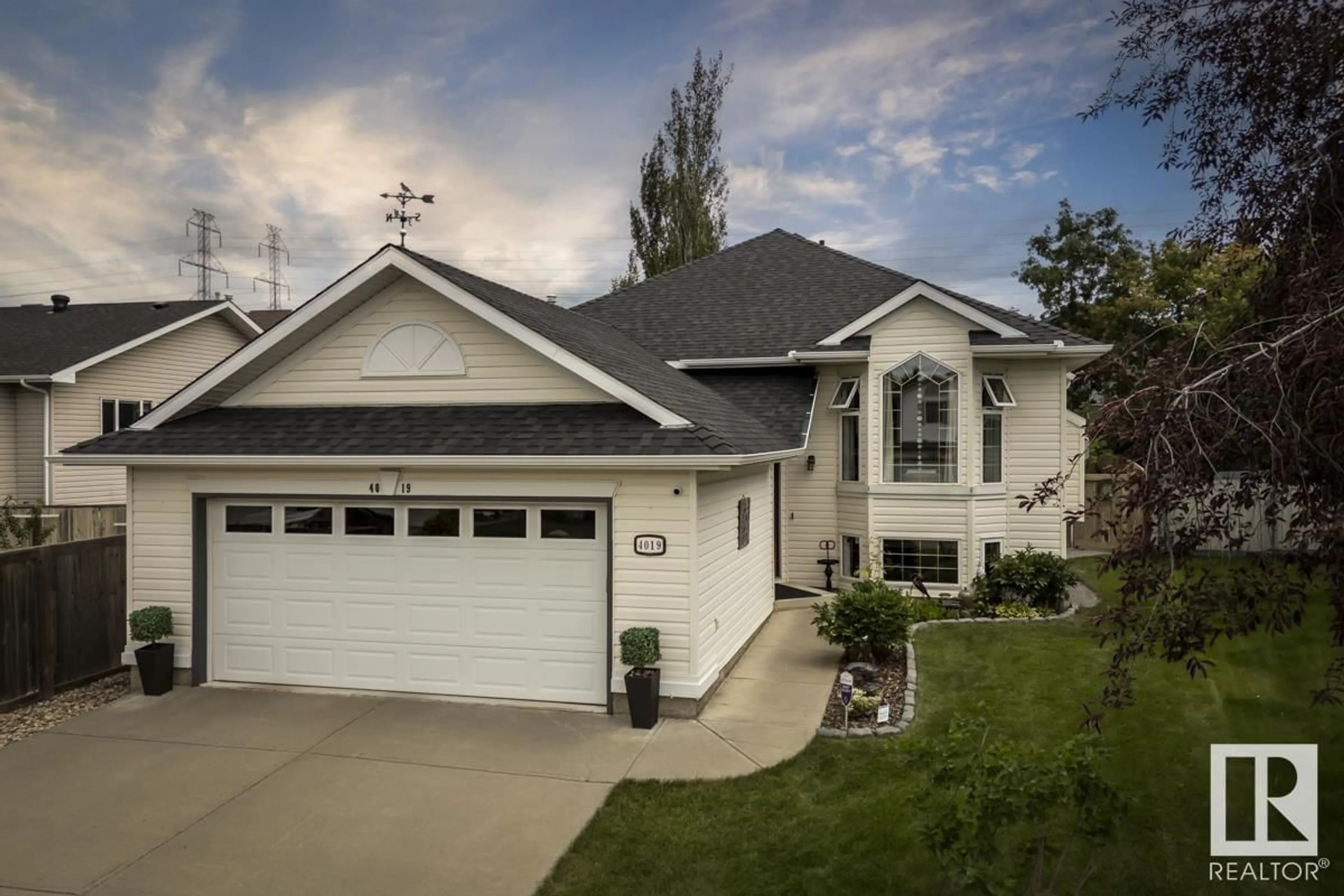 Home with vinyl exterior material, street for NW - 4019 28A ST, Edmonton Alberta T6T1L8
