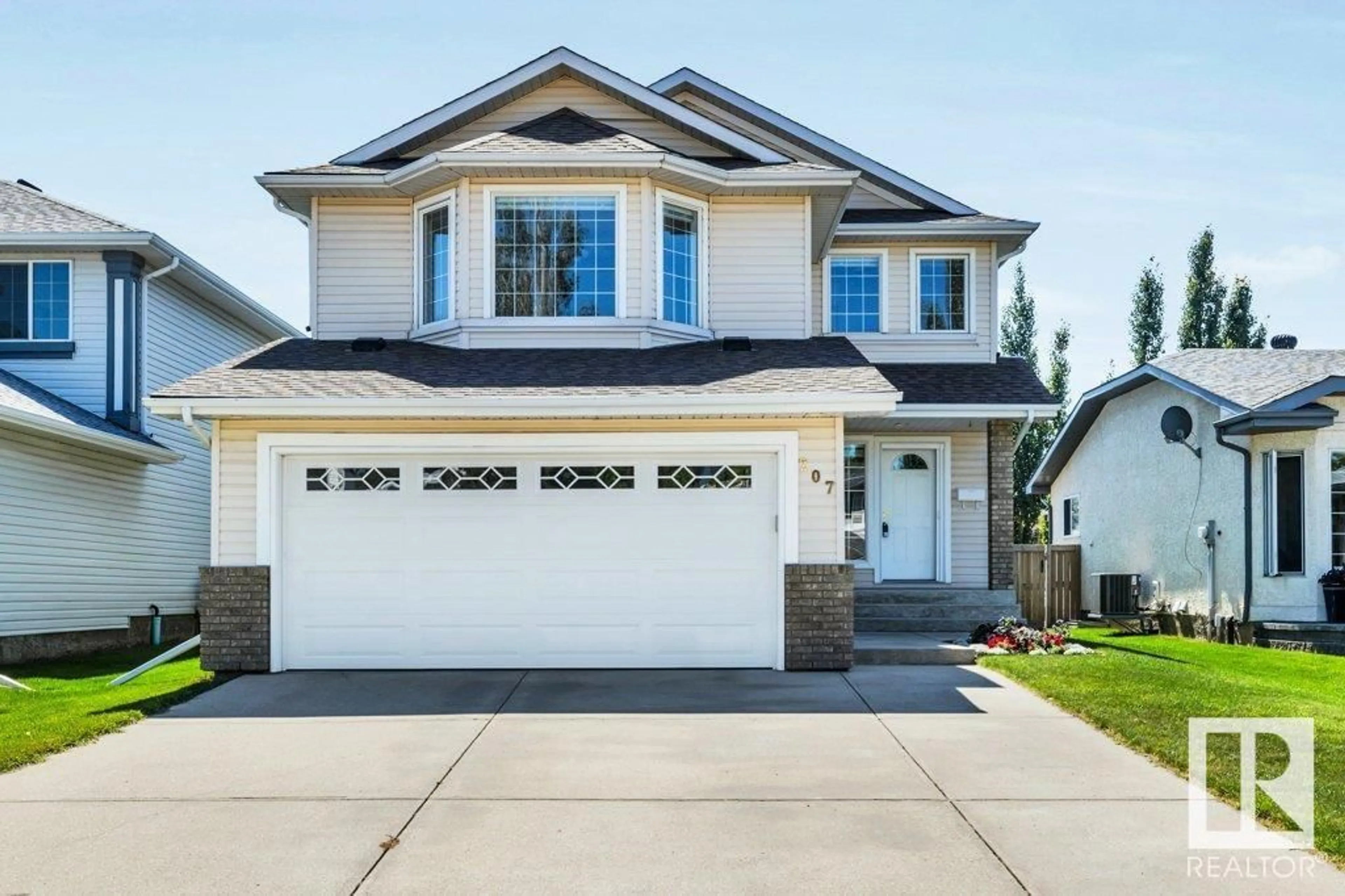 Home with vinyl exterior material, street for 207 BANCROFT CL, Edmonton Alberta T5T6B5
