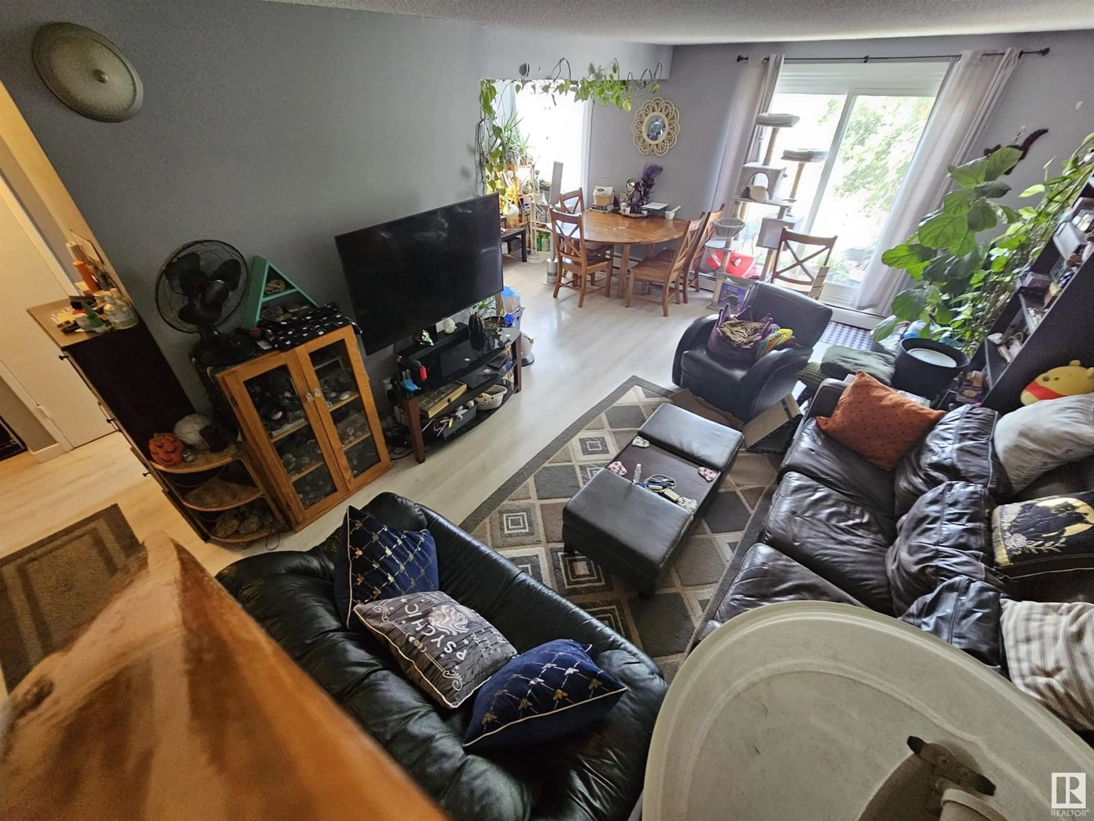 Living room with furniture, unknown for 20 10616 123 ST NW, Edmonton Alberta T5N1P2