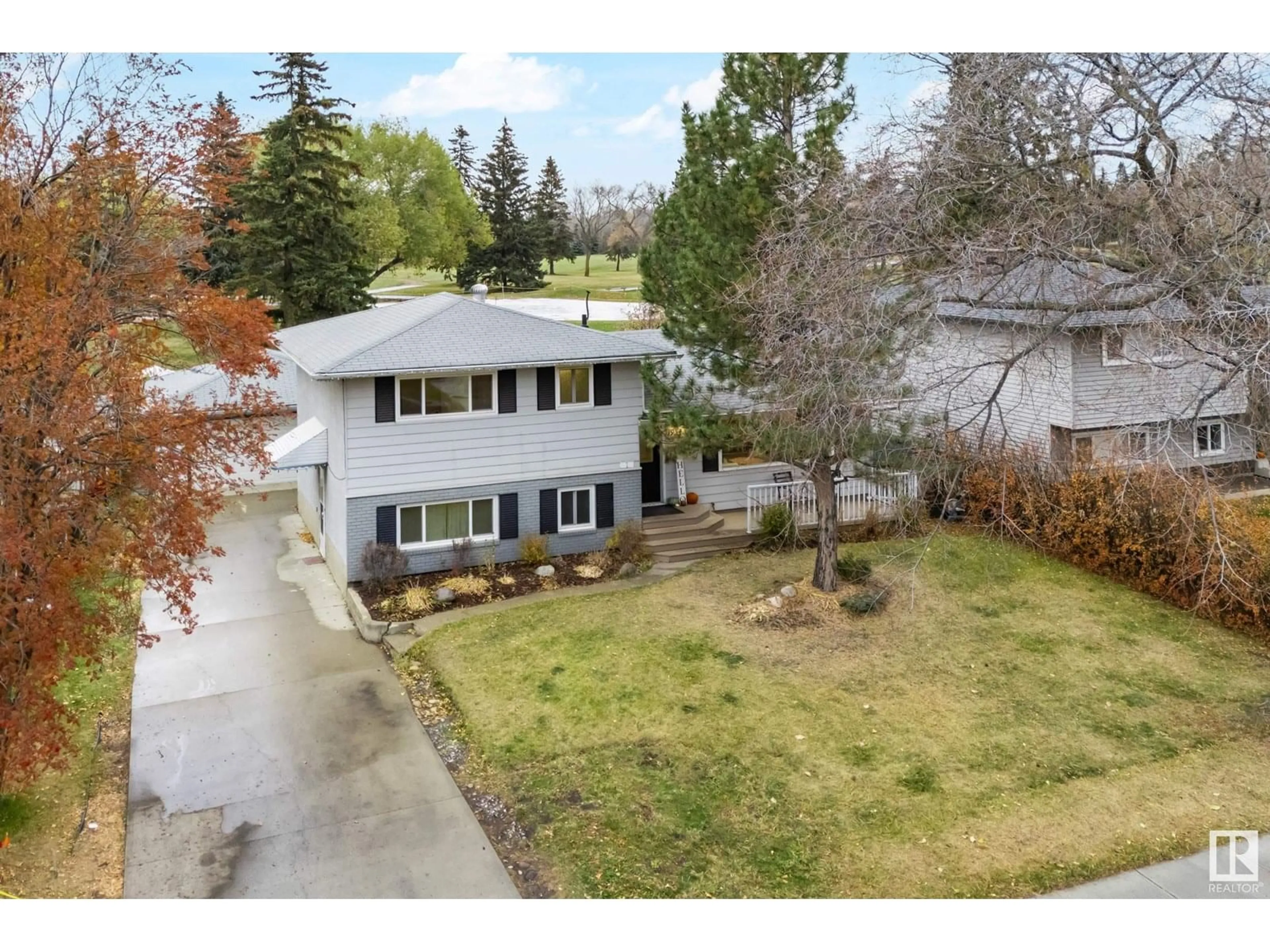 A pic from outside/outdoor area/front of a property/back of a property/a pic from drone, street for 1934 GLENMORE AVENUE, Sherwood Park Alberta T8A0X5