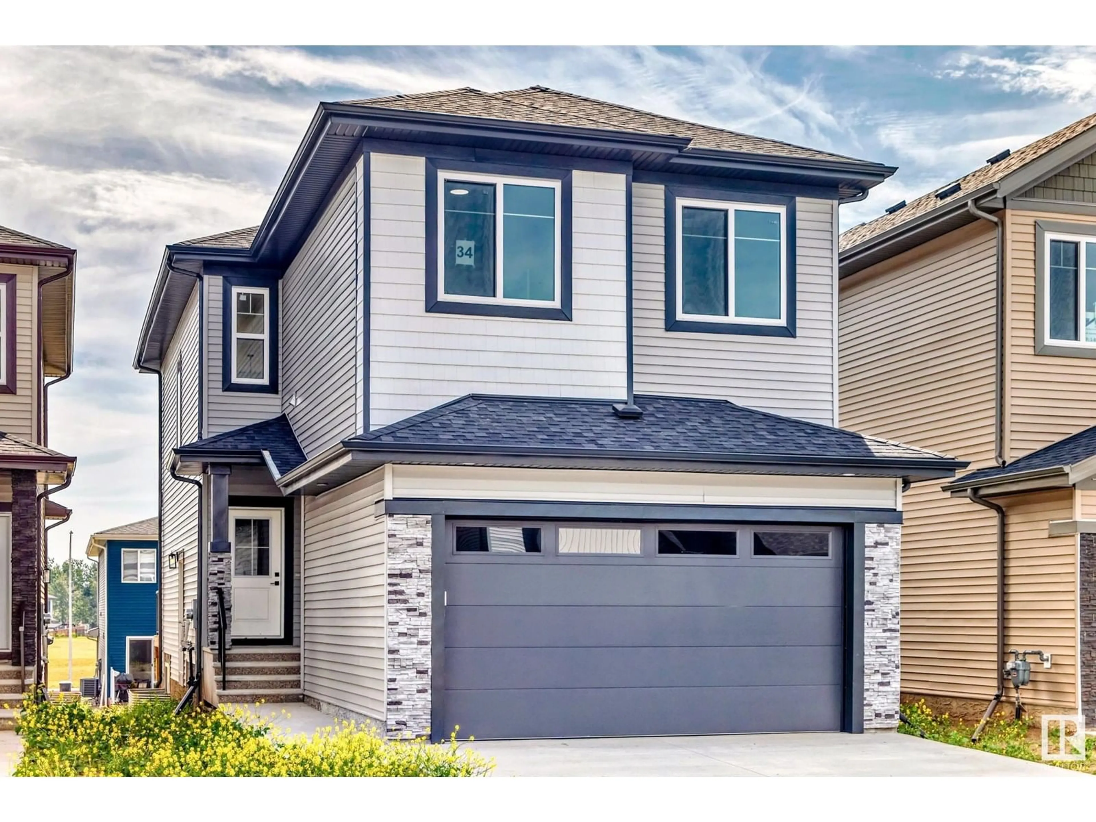 Home with vinyl exterior material, street for 34 ASHBURY CR, Spruce Grove Alberta T7X3C6