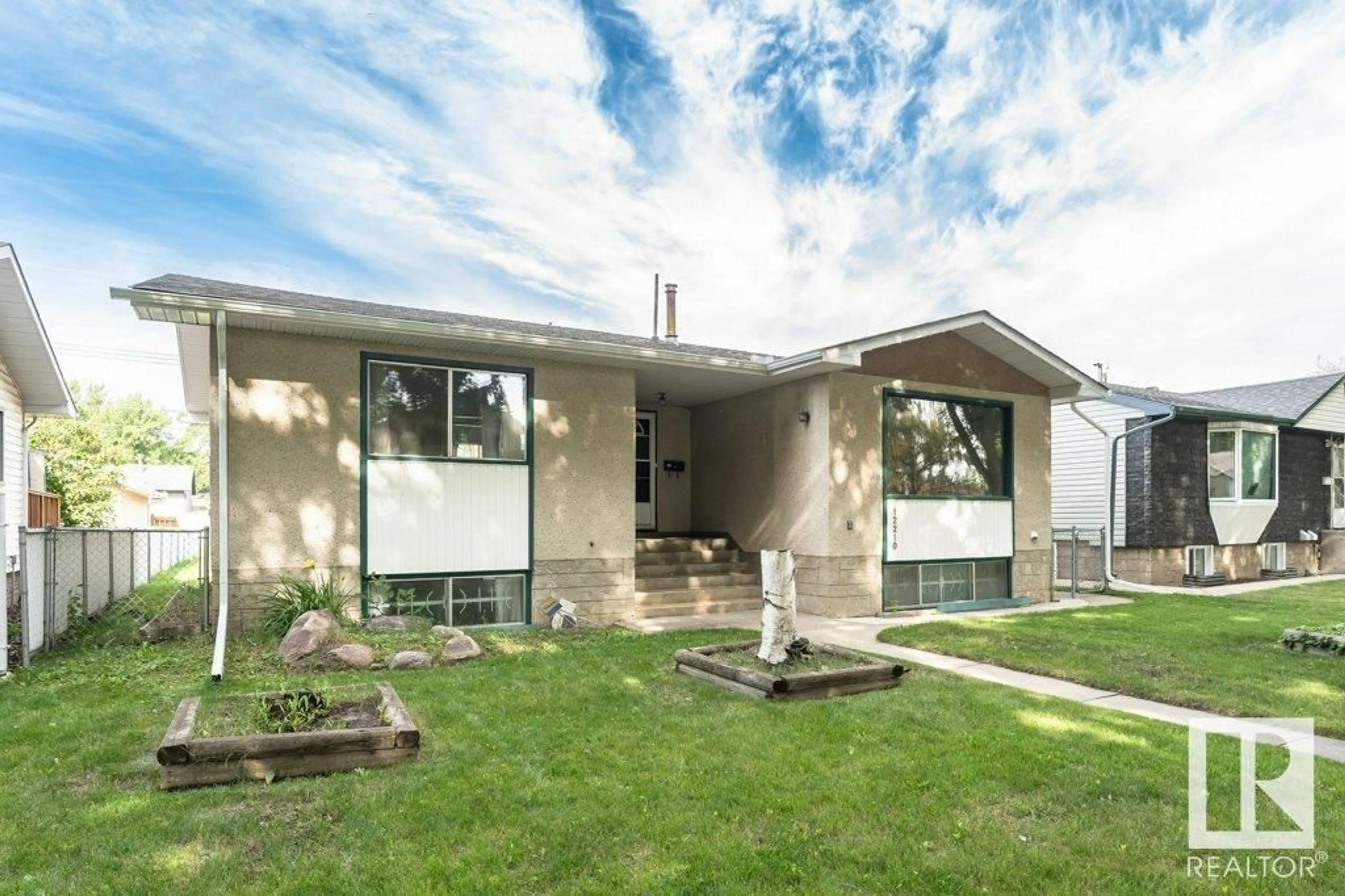 Home with vinyl exterior material, street for 12210 46 ST, Edmonton Alberta T5W2W6