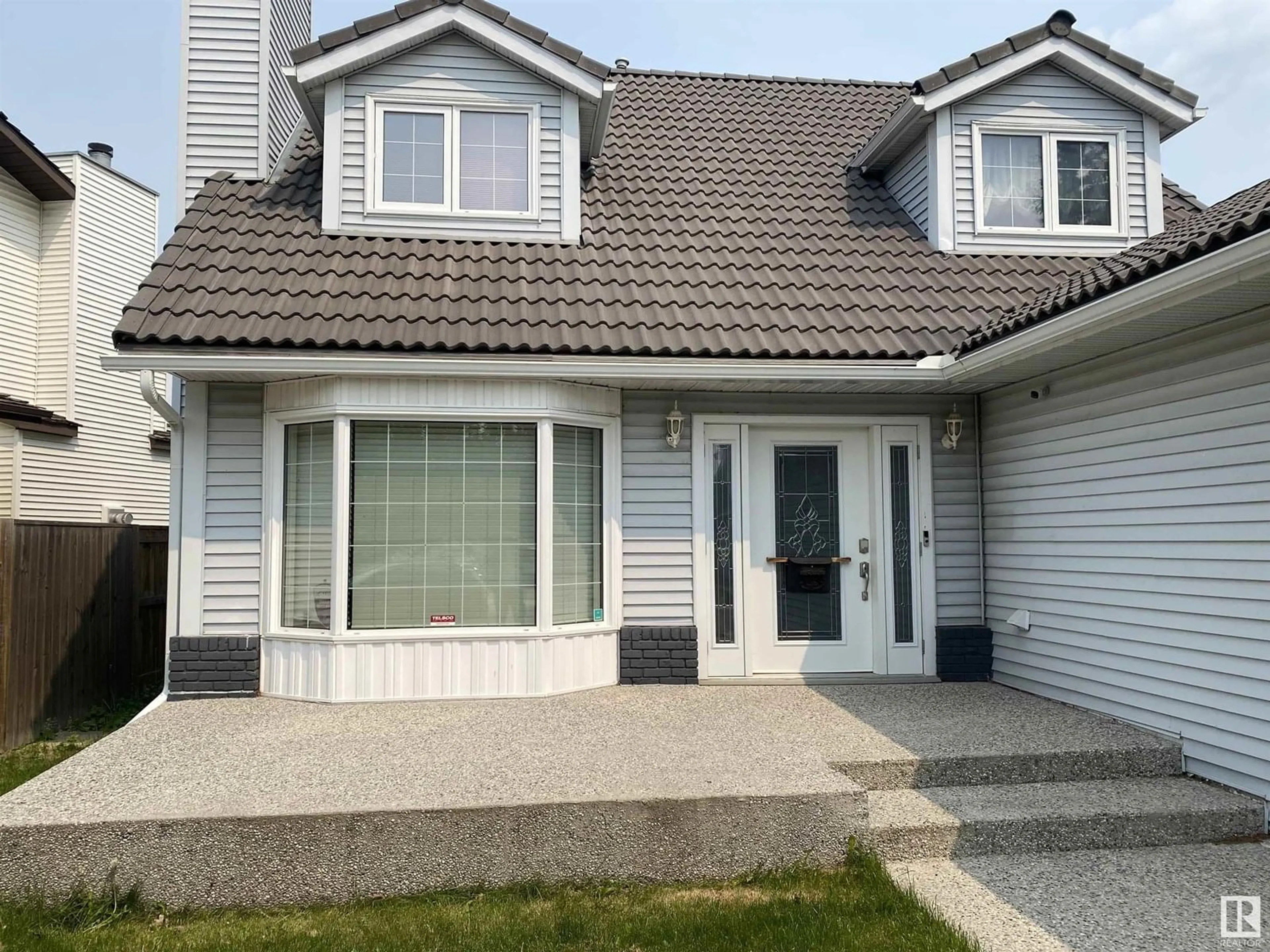 Home with vinyl exterior material, street for NW - 27 CASTLE KEEP KE, Edmonton Alberta T5X5K6