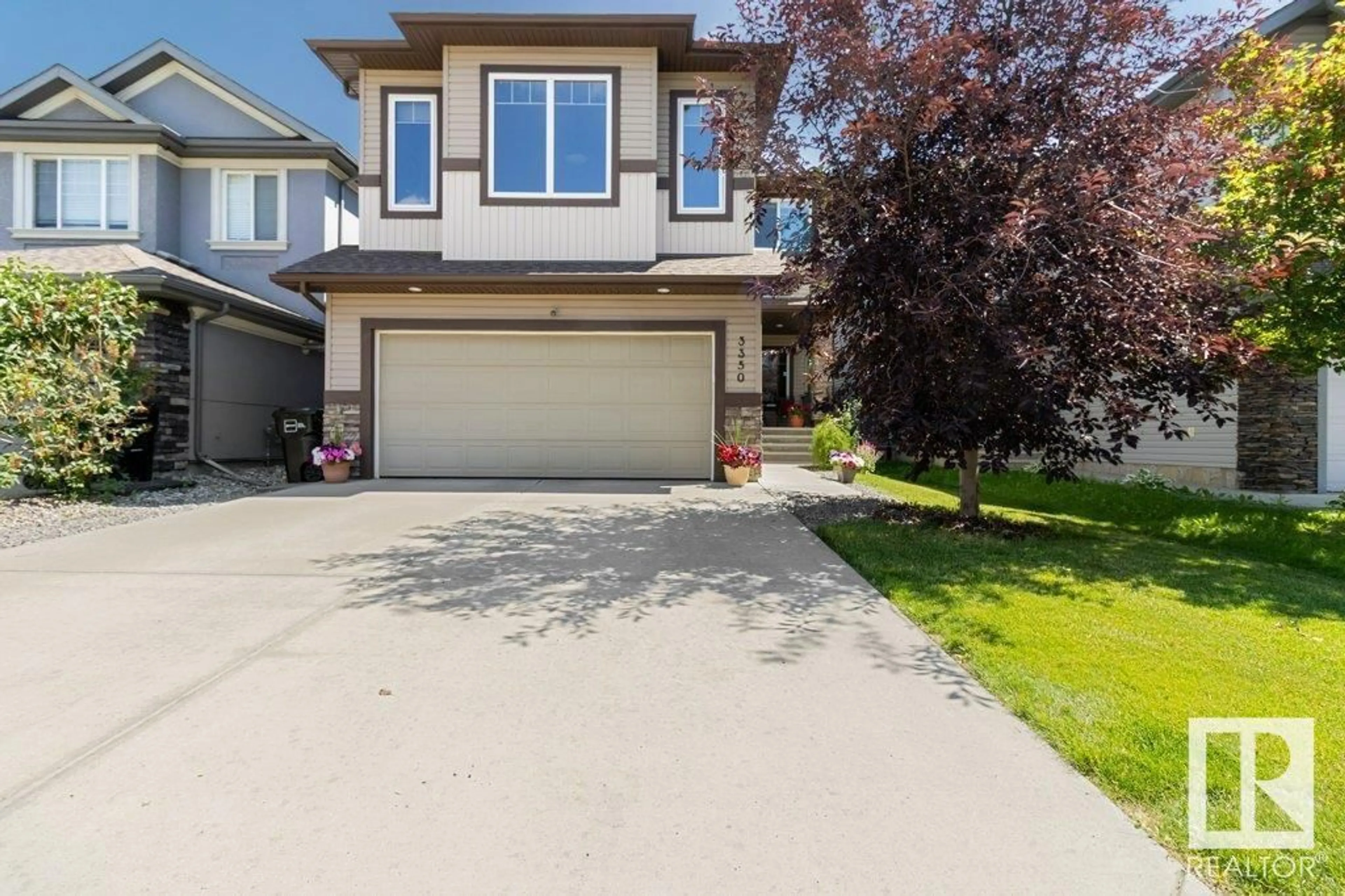 Home with vinyl exterior material, street for 3350 HILTON CR, Edmonton Alberta T6M0N5