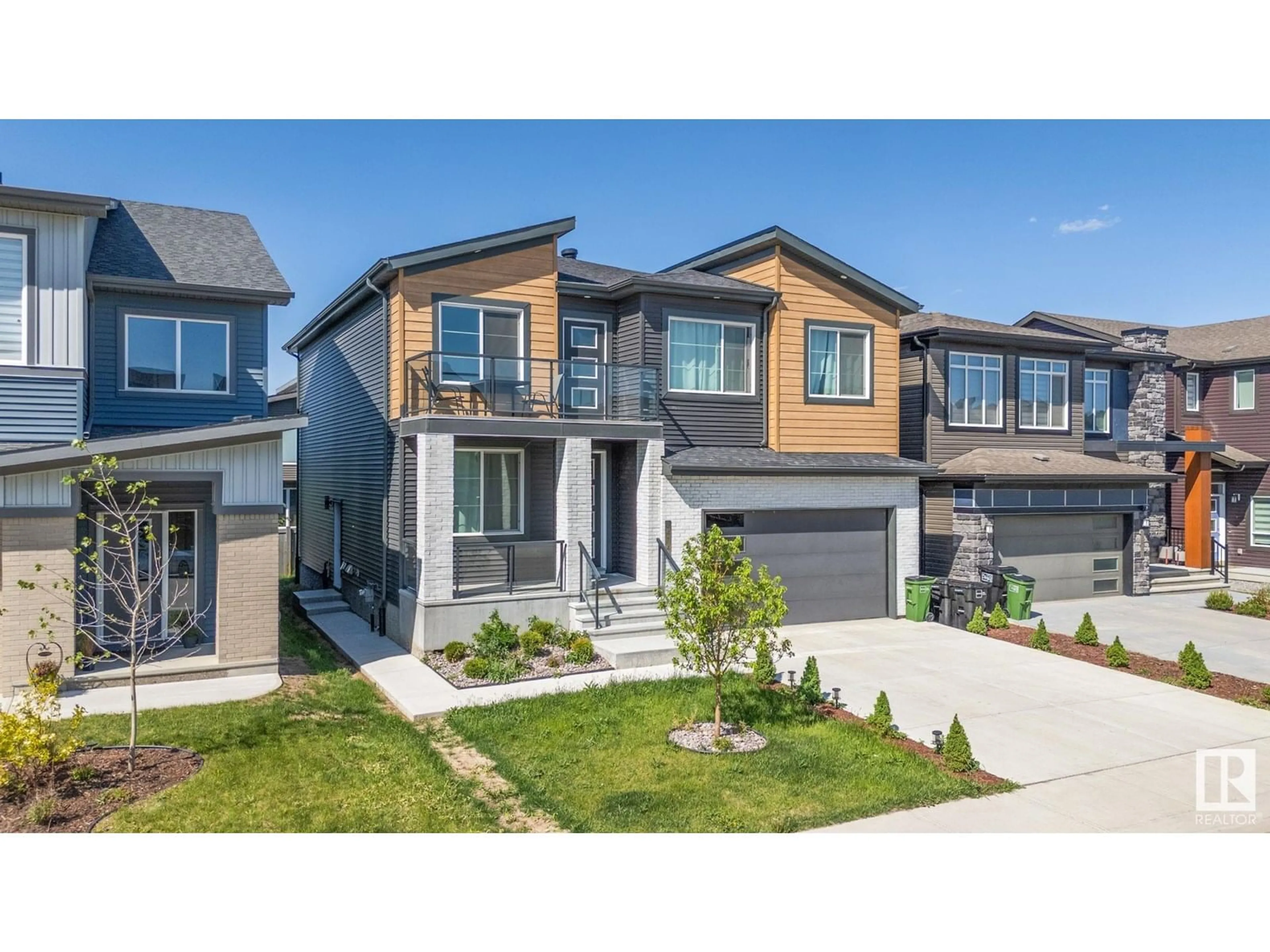 Home with vinyl exterior material, street for SW - 6474 KING WD, Edmonton Alberta T6W1A5