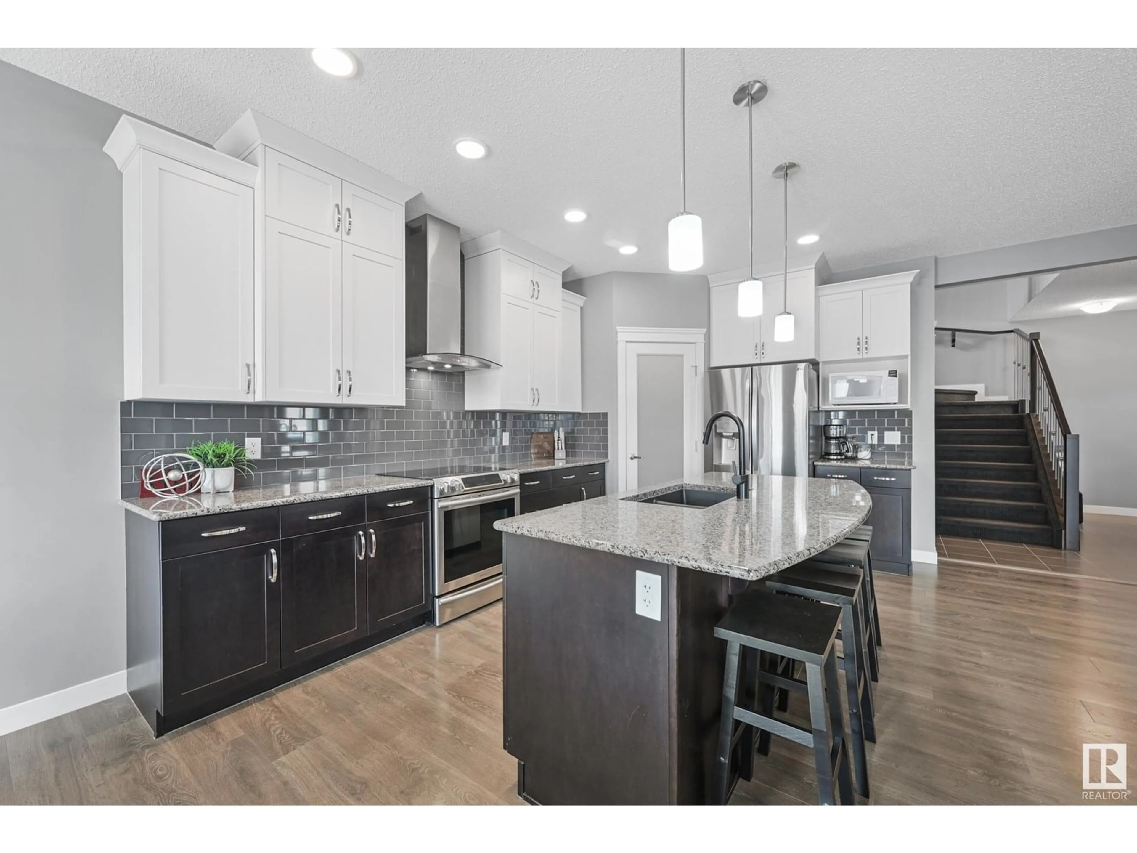 Open concept kitchen, ceramic/tile floor for 12303 176 AV, Edmonton Alberta T5X0L2
