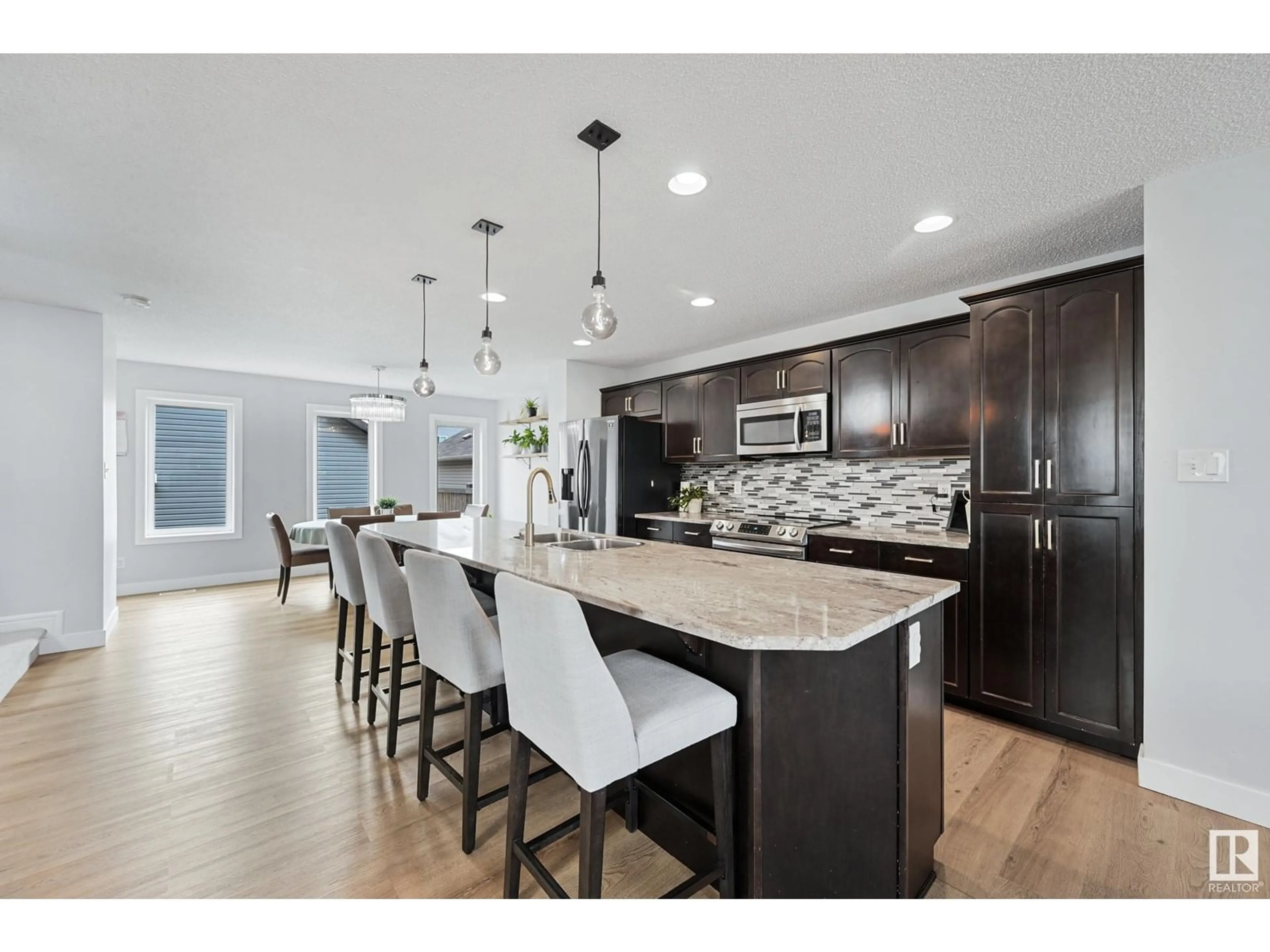 Open concept kitchen, ceramic/tile floor for 17103 121 ST NW, Edmonton Alberta T5X0H4