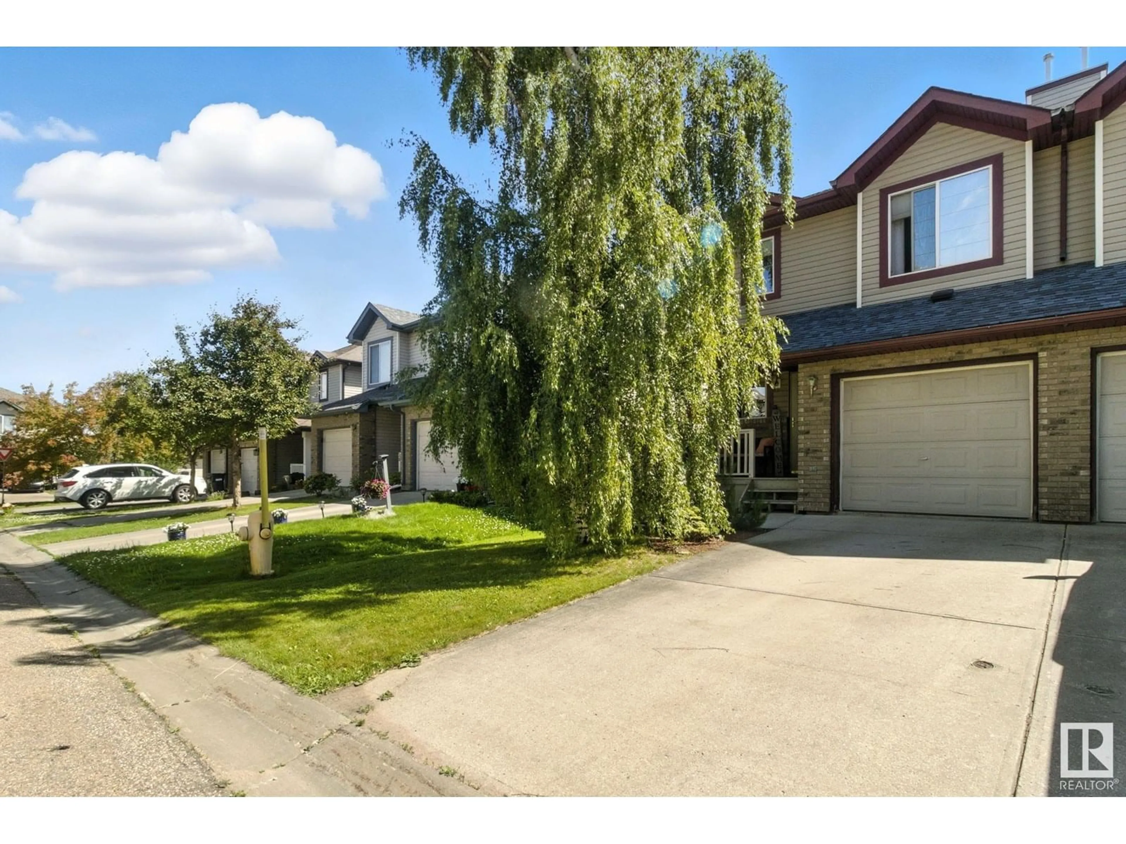 A pic from outside/outdoor area/front of a property/back of a property/a pic from drone, street for 24 VISTA ST, Spruce Grove Alberta T5X4P6
