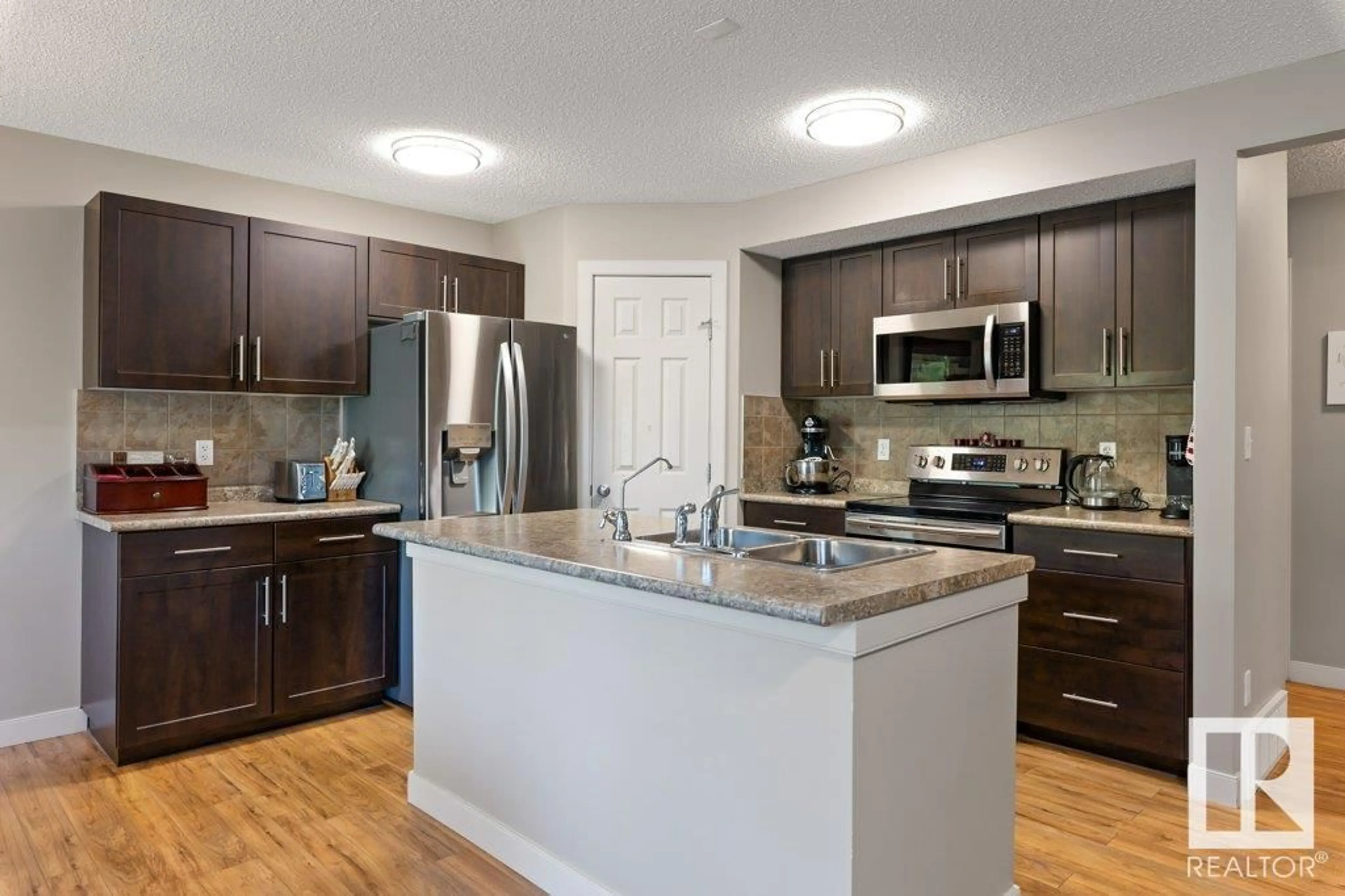 Open concept kitchen, unknown for 20030 131 AV, Edmonton Alberta T5S0E2