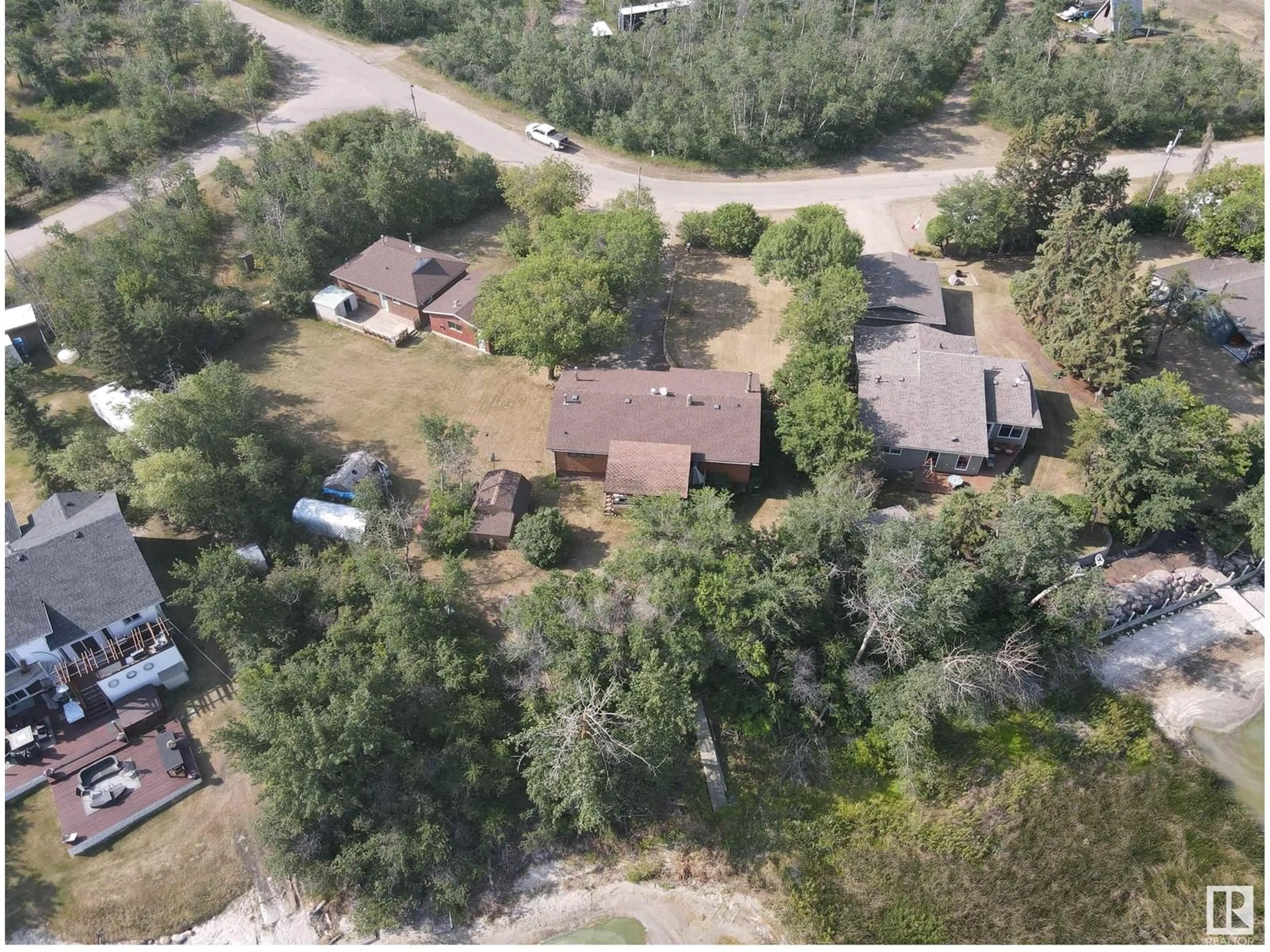 A pic from outside/outdoor area/front of a property/back of a property/a pic from drone, unknown for 32 47018 TWP RD 604A, Rural Bonnyville M.D. Alberta T9N2J6