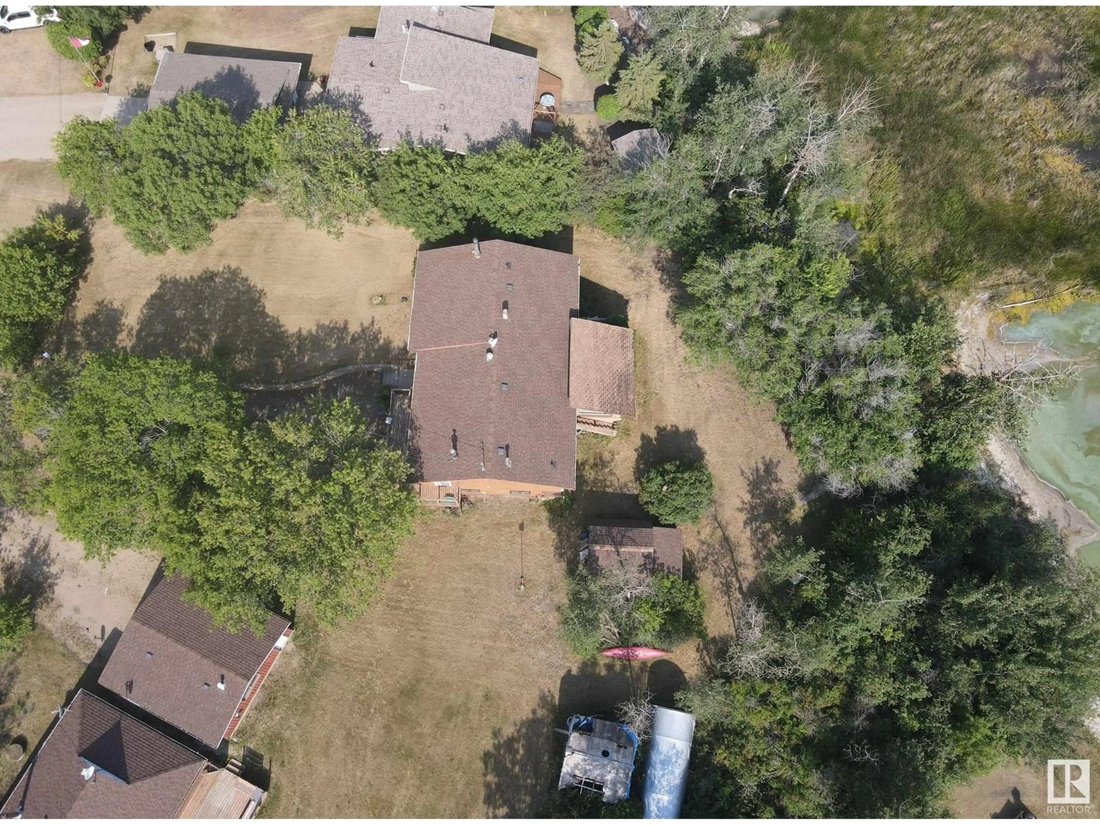 A pic from outside/outdoor area/front of a property/back of a property/a pic from drone, street for 32 47018 TWP RD 604A, Rural Bonnyville M.D. Alberta T9N2J6