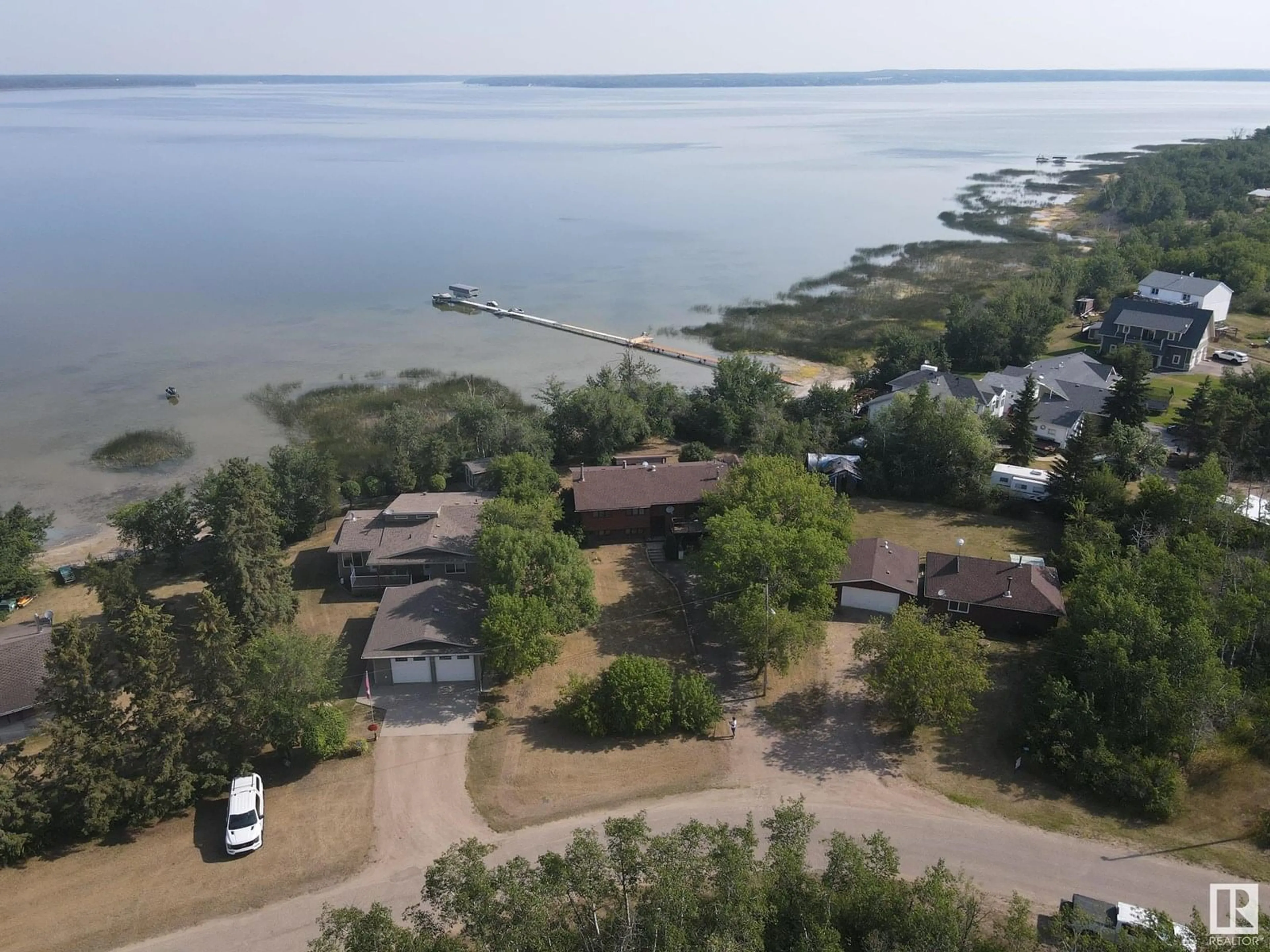 A pic from outside/outdoor area/front of a property/back of a property/a pic from drone, water/lake/river/ocean view for 32 47018 TWP RD 604A, Rural Bonnyville M.D. Alberta T9N2J6