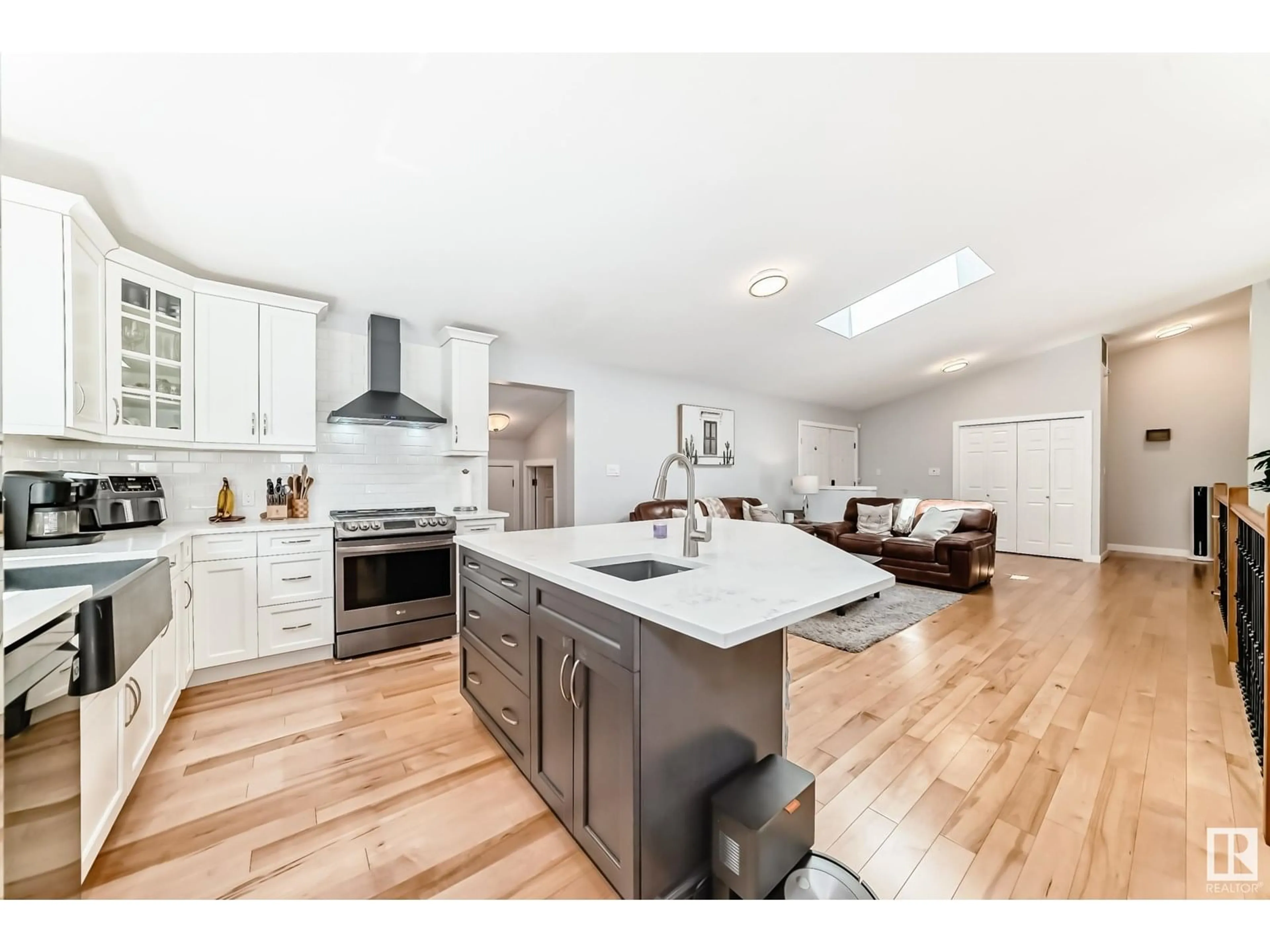 Open concept kitchen, wood/laminate floor for 424 BUTCHART DR, Edmonton Alberta T6R1R1