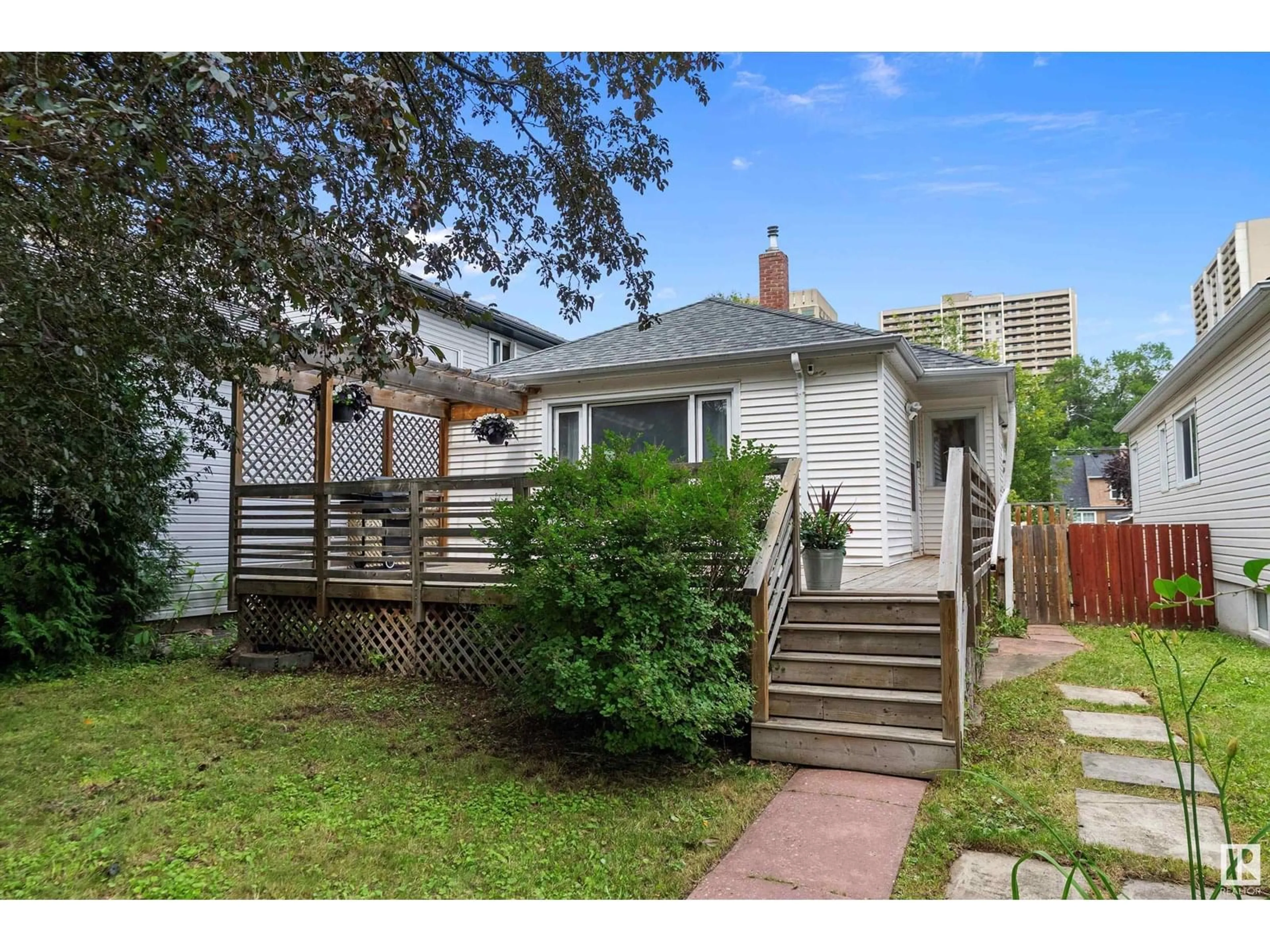 Home with vinyl exterior material, street for NW - 11126 80 AV, Edmonton Alberta T6G0R5