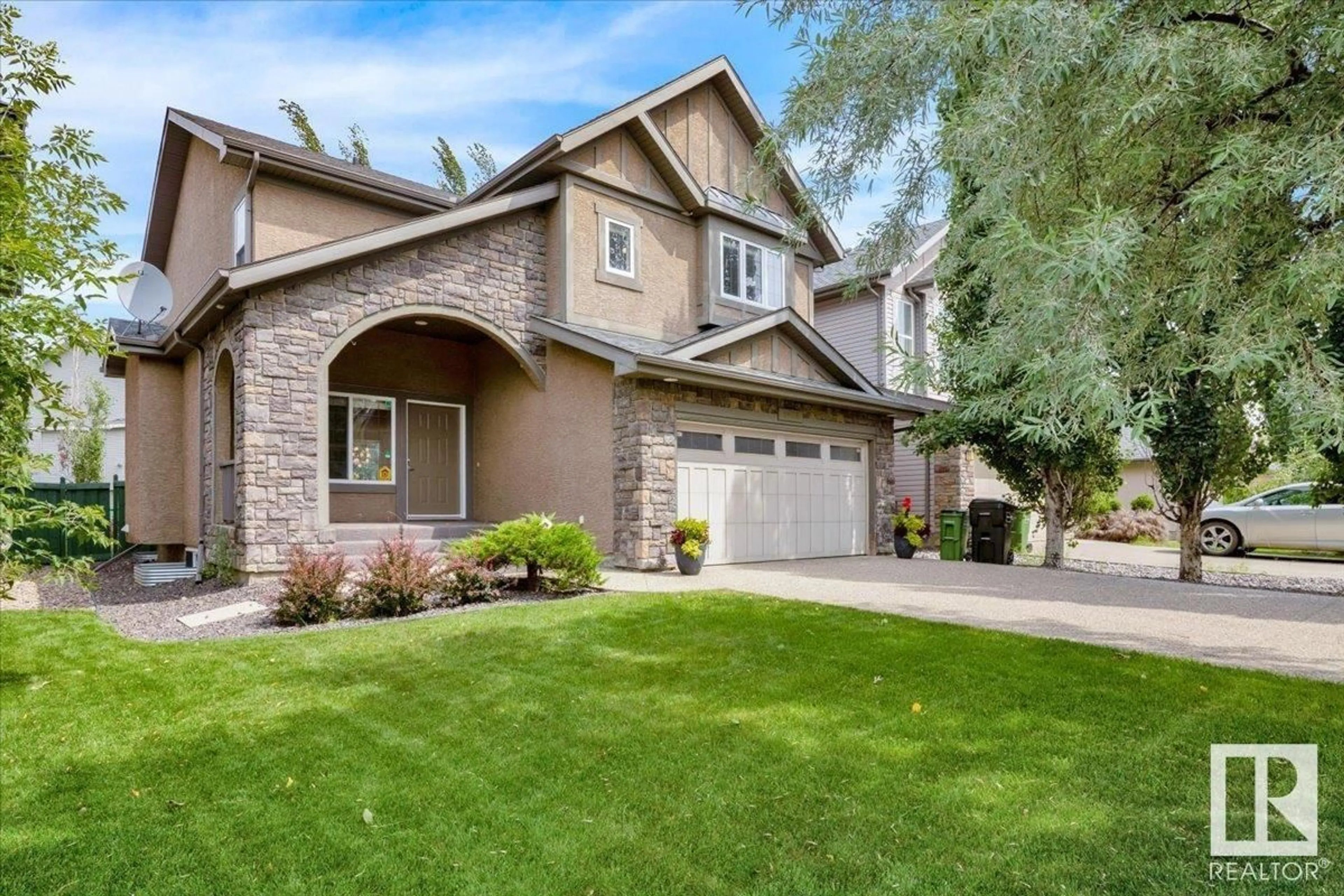 Home with brick exterior material, street for 1669 HECTOR RD, Edmonton Alberta T6R3B8