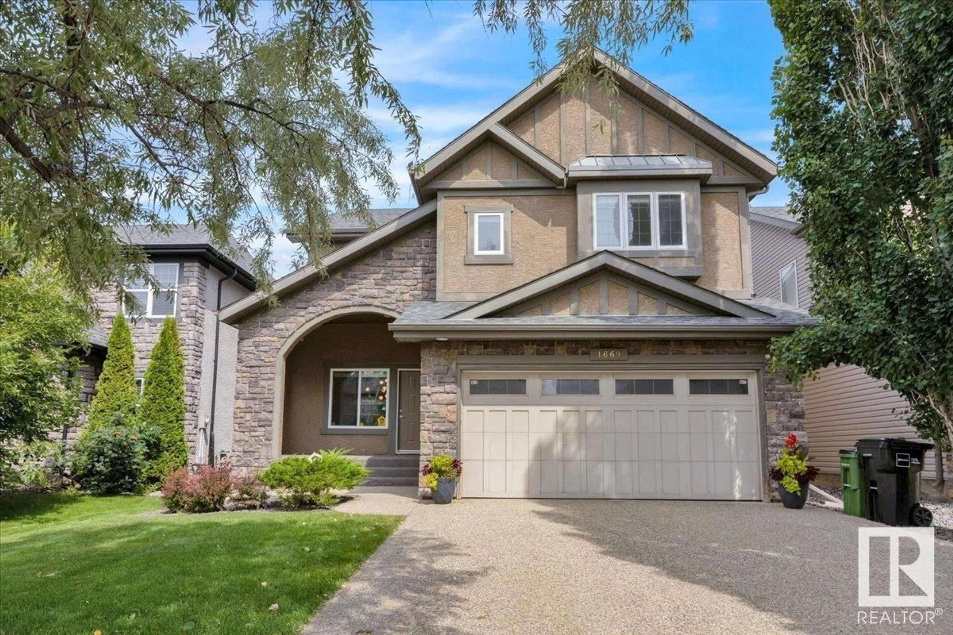 Home with brick exterior material, street for 1669 HECTOR RD, Edmonton Alberta T6R3B8