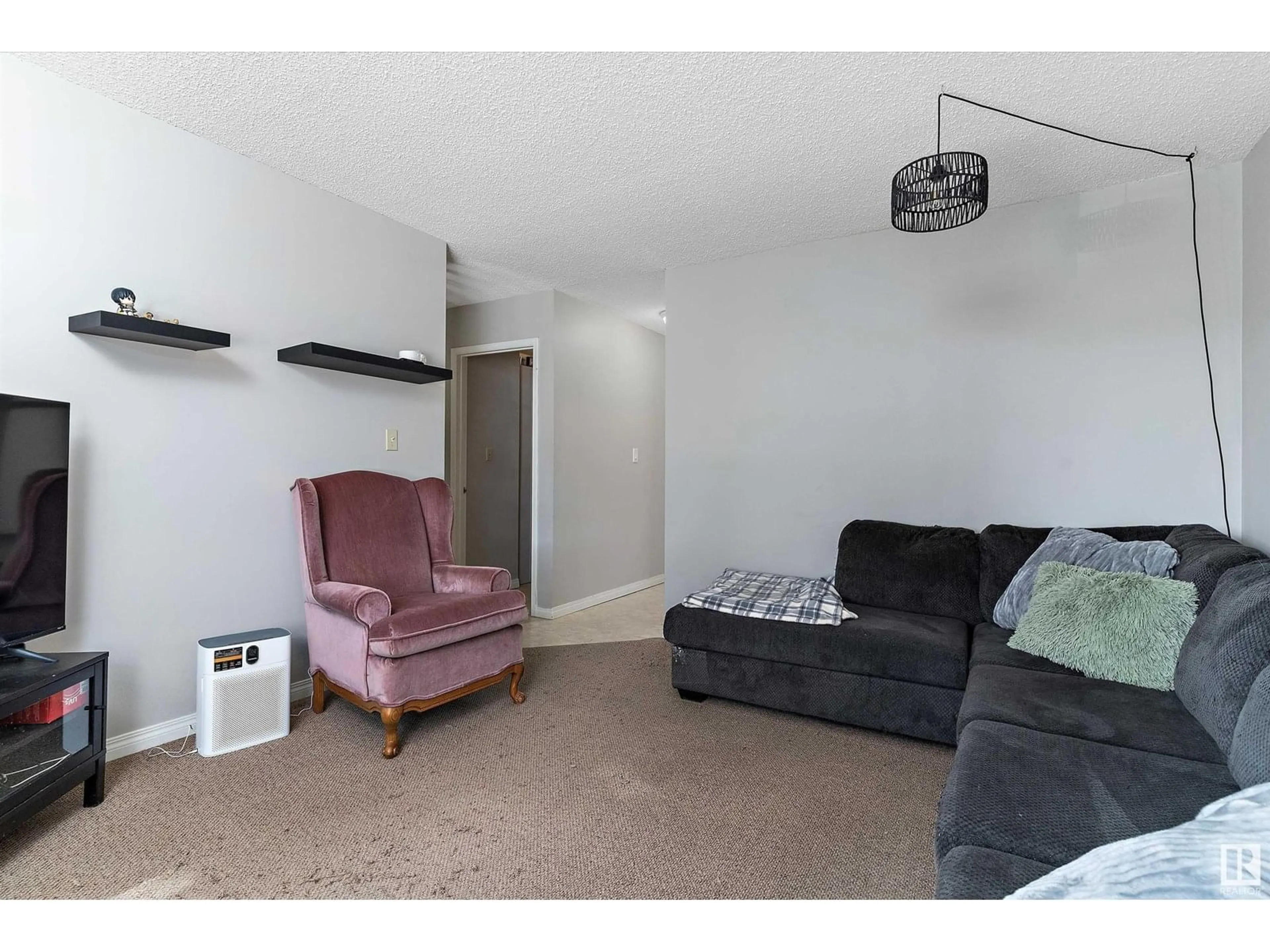 Living room with furniture, unknown for NW - 12004 & 12006 128 AV, Edmonton Alberta T5E6J5