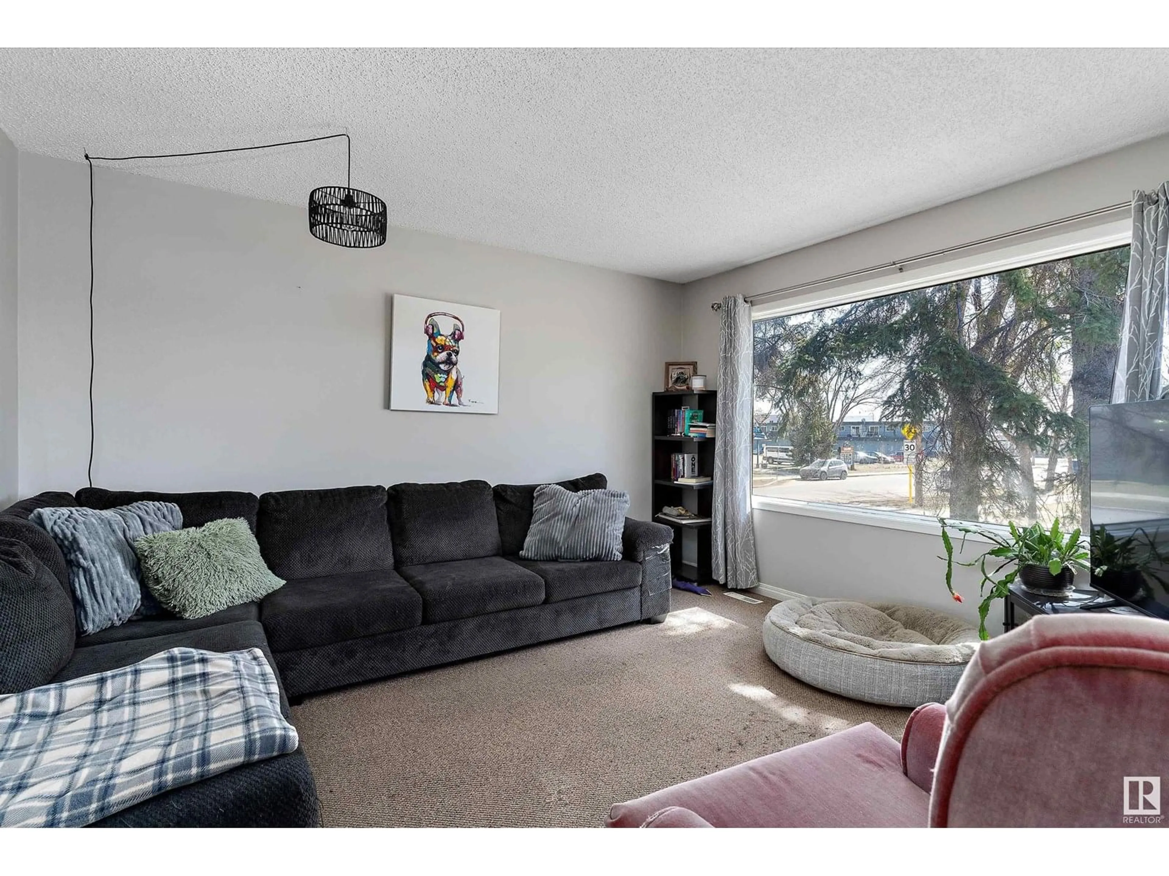 Living room with furniture, unknown for NW - 12004 & 12006 128 AV, Edmonton Alberta T5E6J5