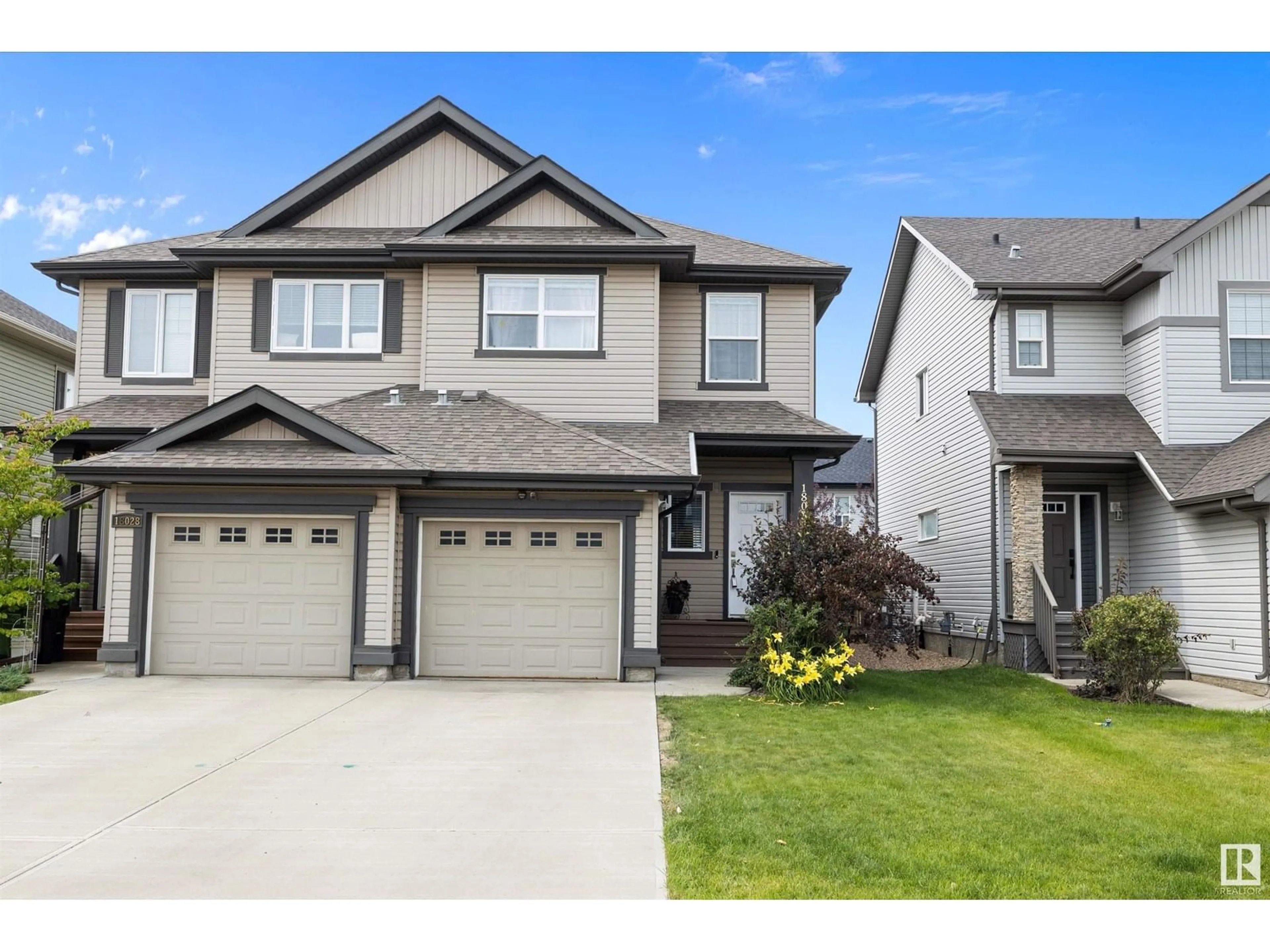 Home with vinyl exterior material, street for 18032 85 ST, Edmonton Alberta T5Z0E4