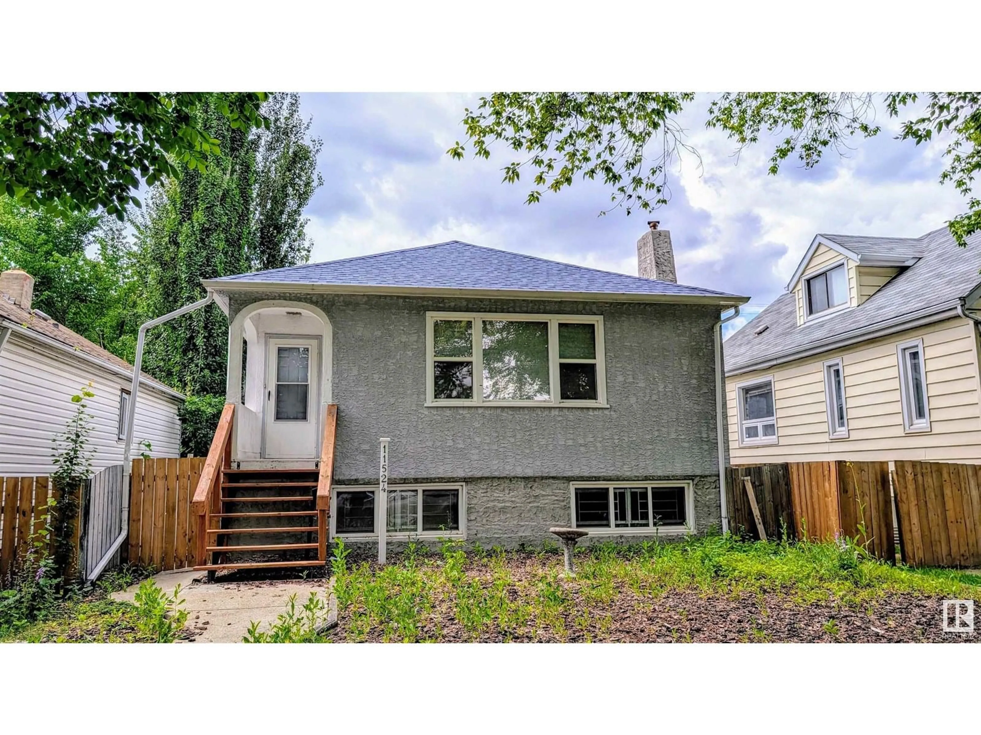 Home with vinyl exterior material, street for NW - 11524 83 ST, Edmonton Alberta T5B2Y5