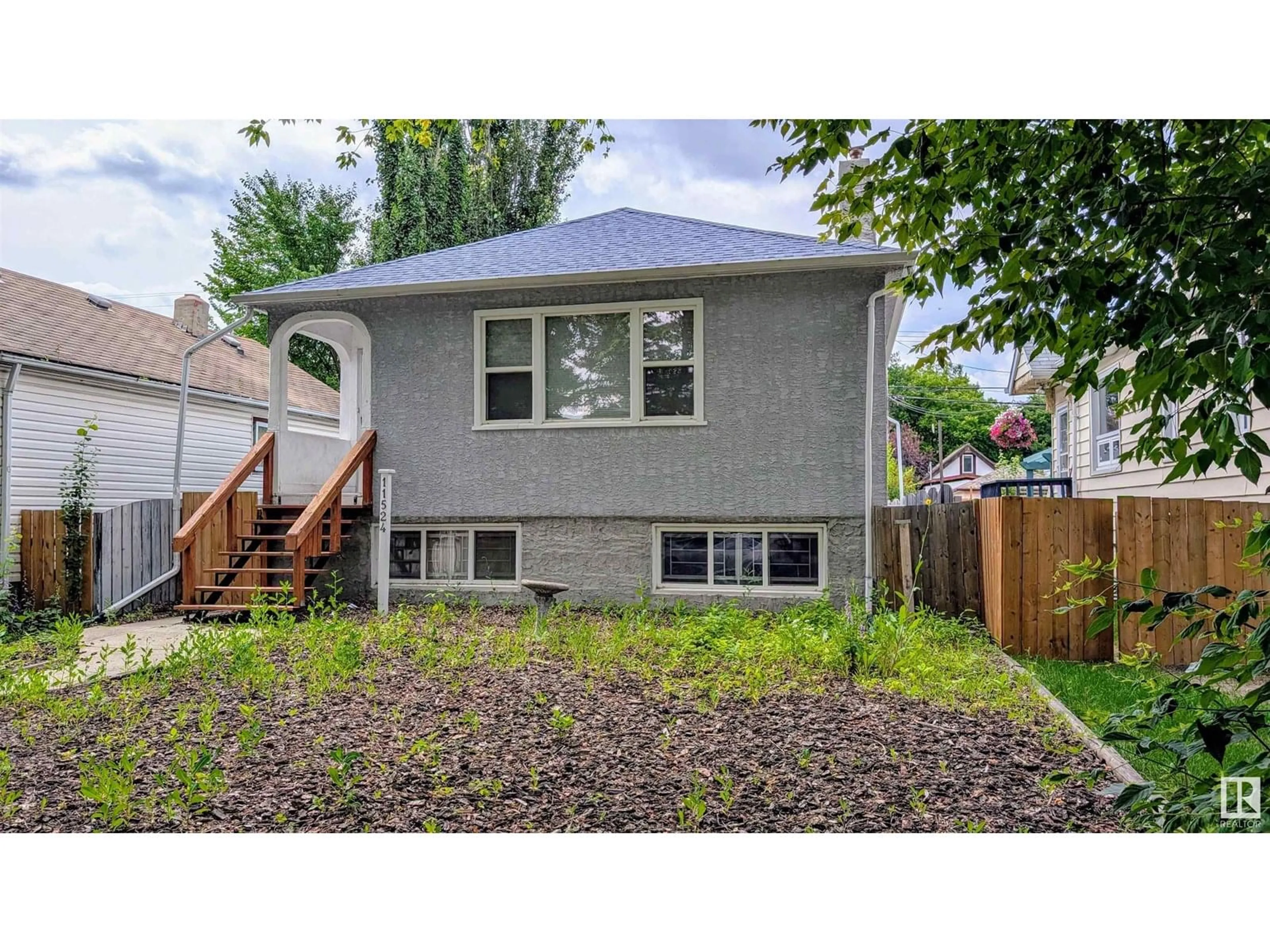 Home with vinyl exterior material, street for NW - 11524 83 ST, Edmonton Alberta T5B2Y5