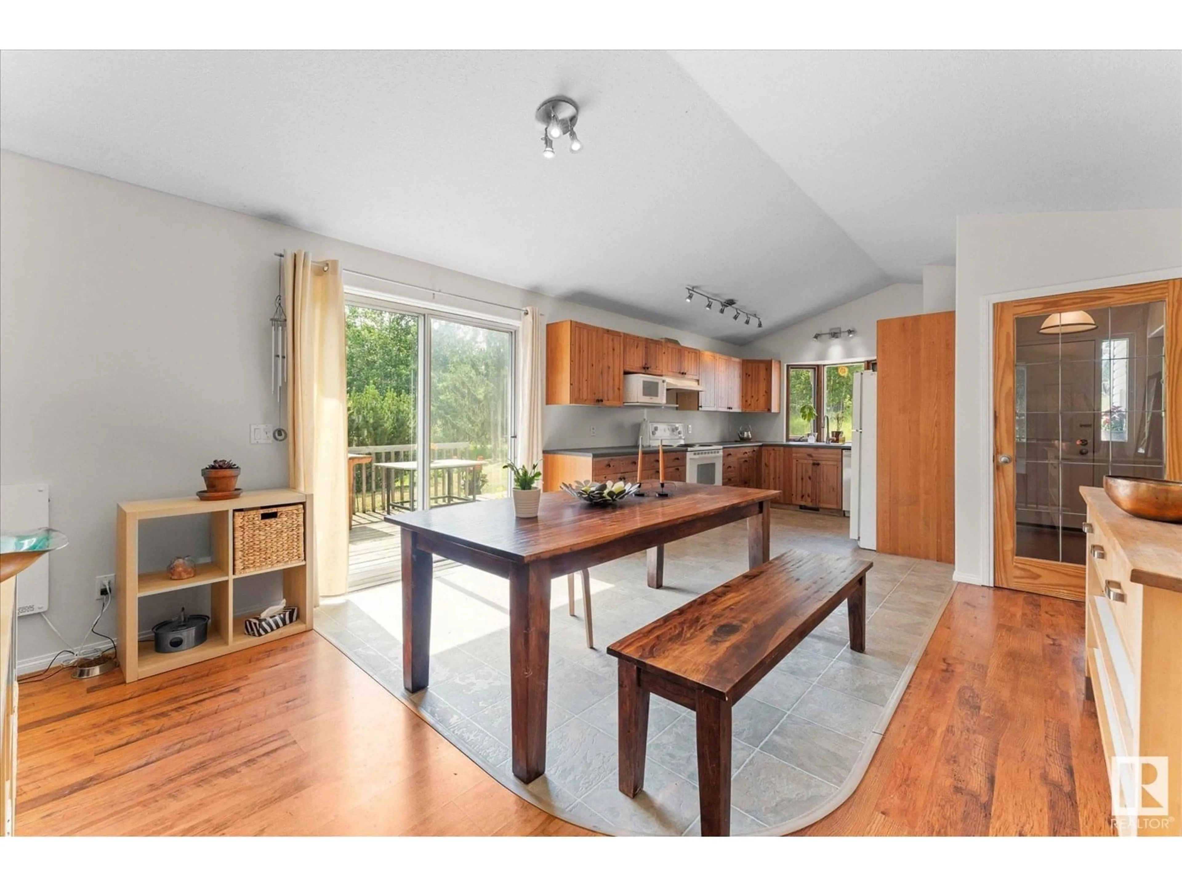 Open concept kitchen, wood/laminate floor for 30 54228 RGE ROAD 12, Rural Lac Ste. Anne County Alberta T0E1V2