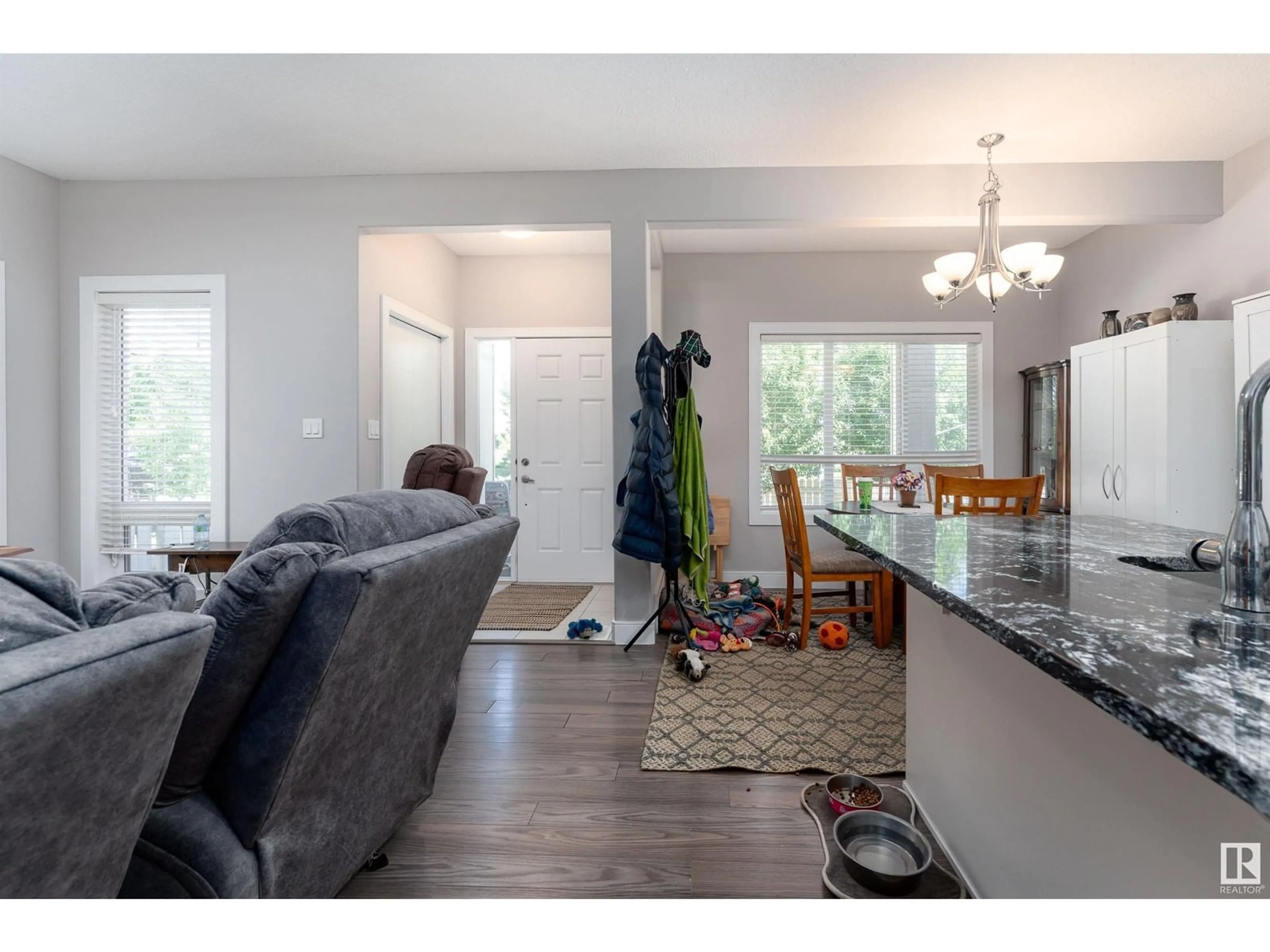 Open concept kitchen, wood/laminate floor for 13013 132 AV, Edmonton Alberta T5L3R2